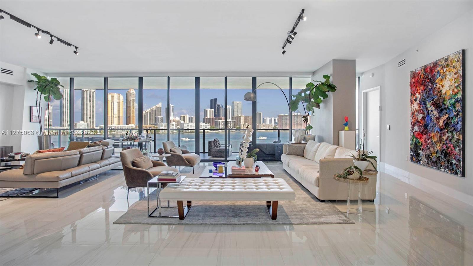 Experience luxury living in this exquisite corner unit at PRIVE Island. This stunning 4-bedroom, 4-bathroom residence spans over 3600 SqFt and has high-end finishes throughout. Enjoy breathtaking panoramic views of the ocean and inter-coastal from your home. This unit comes with 3 parking spaces, 2 storages, a staff room, and access to a private marina. Don't miss the chance to call this luxurious property your home. Revel in the extraordinary lifestyle offered by PRIVE, featuring 70,000 SqFt of indoor social spaces, 2 gyms, a private restaurant, massage treatment room, sauna, tennis court, toddlers' playroom, billiards table, and 2 beautiful pools.