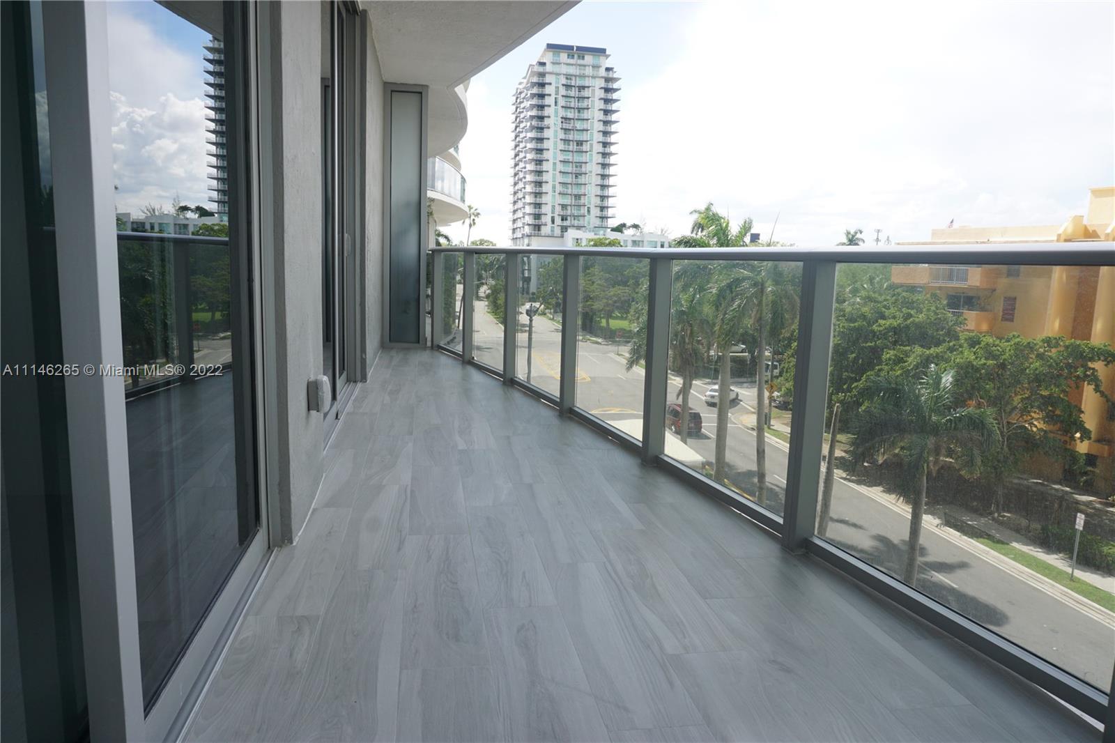 This Luxury unit features European kitchen cabinets, Bosch stainless steel appliances, built-in closets, motorized blinds, and 9-foot ceilings. Enjoy all the outstanding amenities such as 2 curved sunrise/sunset pools and a jacuzzi overlooking the bay, theater, private spa, summer kitchen, BBQ area, state-of-the-art gym and yoga studio, lounge with bar and pool tables, business center, game room, and library, party room in addition to being in front of Margaret Pace Park and inside the Art & Entertainment District. 24 hrs concierge, valet parking, security.*Must SEE *Tenant Occupied until FEB 17th.