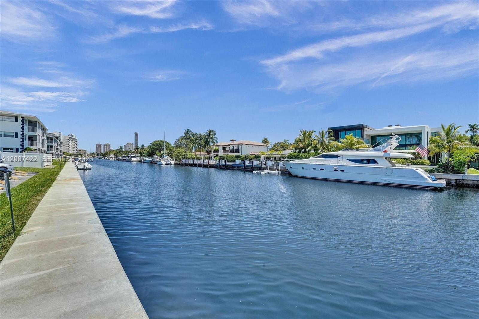 455 Paradise Isle Blvd, Hallandale, FL.  Waterfront living.  Welcome to your perfect getaway or year-round oasis! This remodeled 2-bedroom, 2-bathroom unit offers 1,050 sq. ft. of thoughtfully designed living space in a serene Hallandale location.  Waterviews from the second you enter.
The open kitchen boasts a cooktop, dishwasher, refrigerator, and pantry, and flows seamlessly into the living space, perfect for entertaining. Ceramic floors throughout and hurricane shutters on all windows provide both style and peace of mind. Step outside to your private patio for morning coffee or evening relaxation.  
The community features a sparkling pool, barbecue area, shuffleboard, and a common media/recreation room for socializing or unwinding. An elevator offers easy access to all floors, while assigned parking and guest parking ensure convenience for you and your visitors. Additional perks include access to a bike room and common storage for added functionality.  
This outstanding co-op is a well-rounded retreat that emphasizes modern living with functional outdoor space and countless amenities. Whether you're seeking a tranquil escape or a fun-filled community atmosphere, you’ll find it all here. Schedule your showing today to see this gem for yourself!  Situated on this boutique island community, located close to beaches, shopping, dining and Gulf Stream Racetrack.
Don’t miss out on this opportunity. Your ideal Hallandale lifestyle awaits.