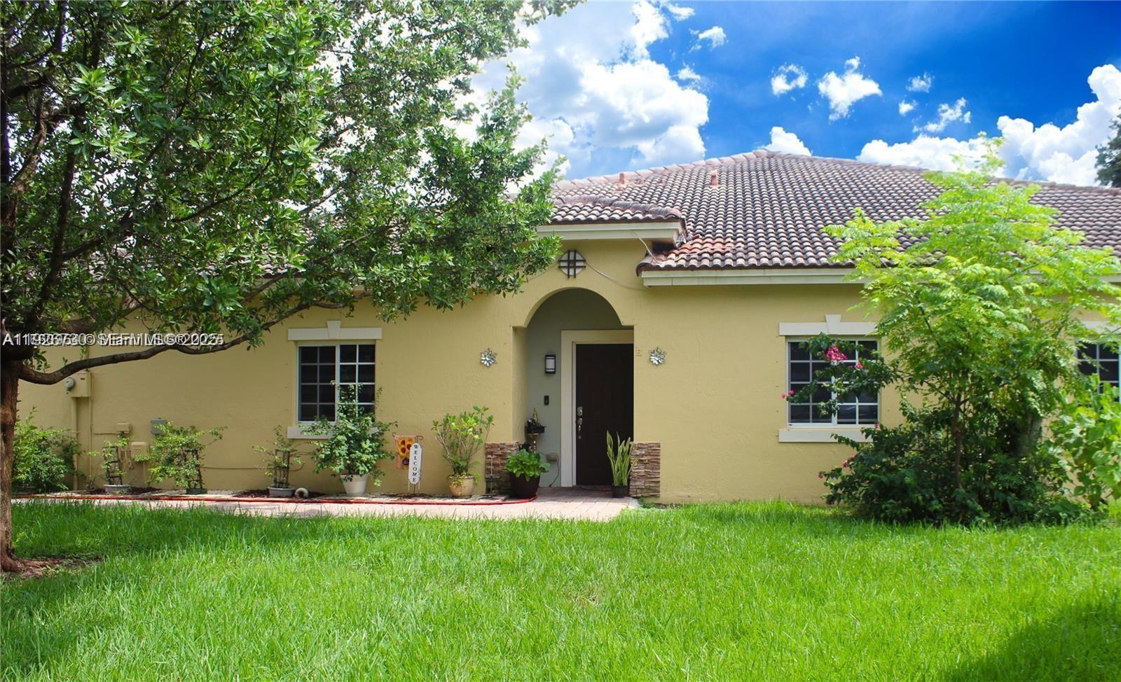 Welcome to this beautifully renovated 3-bedroom, 2-bathroom single-family home right off of exit 2 in Homestead. Step inside to an open layout with high ceilings, allowing for a spacious and airy feel throughout. The interior has been completely updated, featuring new floors, a modern kitchen with new appliances, and an air conditioner installed in 2022. The home's covered terrace is perfect for hosting gatherings, providing a cozy outdoor living space. Additionally, there's a one-car garage for added convenience. Located in a well-maintained community with a low monthly HOA fee, residents can enjoy access to a Clubhouse, gym, and a children's playground. With a new roof and updated amenities, this home is move-in ready and offers both comfort and style.