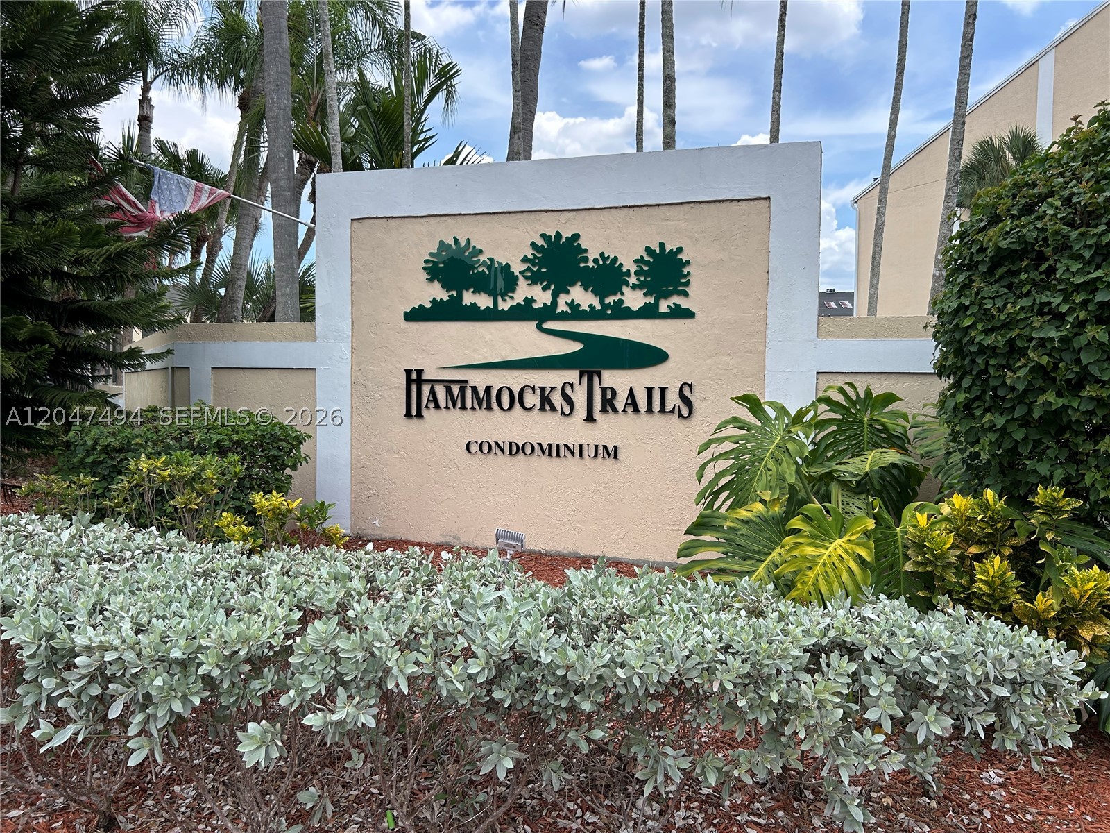 Stop looking—you've found the perfect handyman special! This 1-bedroom, 1-bath condo in the highly desirable Hammocks Trails community is a fantastic opportunity for an owner-occupant looking to customize their home or an investor seeking great value. Located on the second floor, the unit features a spacious screened-in balcony overlooking the beautiful Hammocks lake, an in-unit washer and dryer, and a walk-in closet. While the condo needs some TLC, it has been priced accordingly, making it an excellent opportunity to build equity. Enjoy all the outstanding amenities the Hammocks community has to offer, including a clubhouse, fitness center, tennis and racquetball courts, multiple community pools, children's playgrounds, patrolling security, and the iconic lakeside jogging and biking trail. Residents also enjoy seasonal community events, top-rated schools, convenient access to Baptist Hospital, shopping, dining, and major roadways. Opportunities like this don't come around often. Priced to sell—schedule your showing today before it's’s gone!