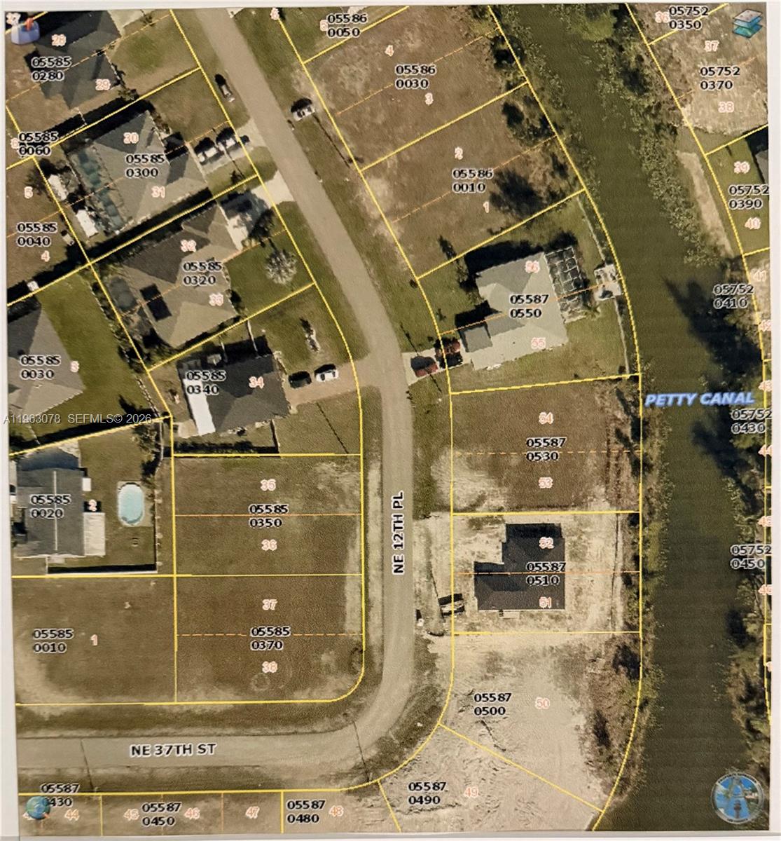 Vacant residential lot offering approximately 10,000 SF in Cape Coral, Florida, one of America's top 10 cities for relocation. This lot is composed of 2 parcels (53 & 54) land is cleared, elevated, and ready for construction of your dream home! Situated between two recently constructed residences, the lot borders a fresh water canal, providing canal views and added privacy. Residential zoning with nearby utilities. Convenient access to Shopping, dining, schools, beaches, marinas, and major roadways. Ideal opportunity for a custom home or future investment. ALSO second lot for sale down the street number 3737 NE 12 PL. MLS #A11962958. PID # 18-43-24-C3-05586-0130.