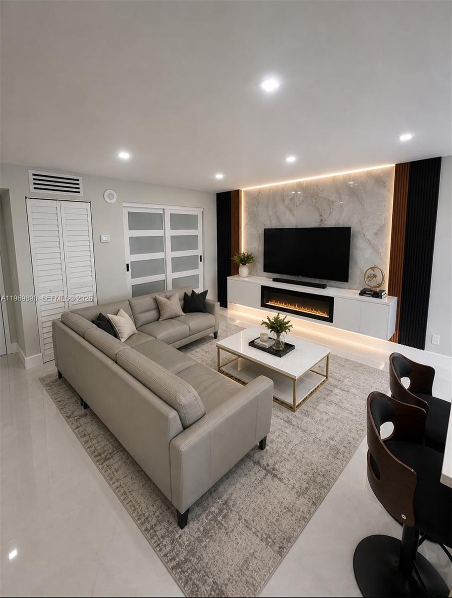 Luxurious fully remodeled apartment, with exquisite design and high-quality materials. Located just two blocks from the beach, it offers a spectacular view of the Sunny Isles Beach skyline and part of the ocean.

- 32" x 32" porcelain tile floor with a modern and elegant design
- LED-lit ceilings that create a cozy and sophisticated atmosphere
- New cabinets and Quartz Countertop with panel decorations that add a touch of luxury
- Bathrooms with imported Spanish Tile, modern bathroom fixtures, Toilet and vanities with lighted mirrors that create a spa-like ambiance
- Very fine and elegant doors and closets that add a touch of sophistication
- Remote-controlled roller shades - motorized
- Spectacular view of the Sunny Isles Beach skyline and the ocean between the towers or skyscrapers that border the coast.