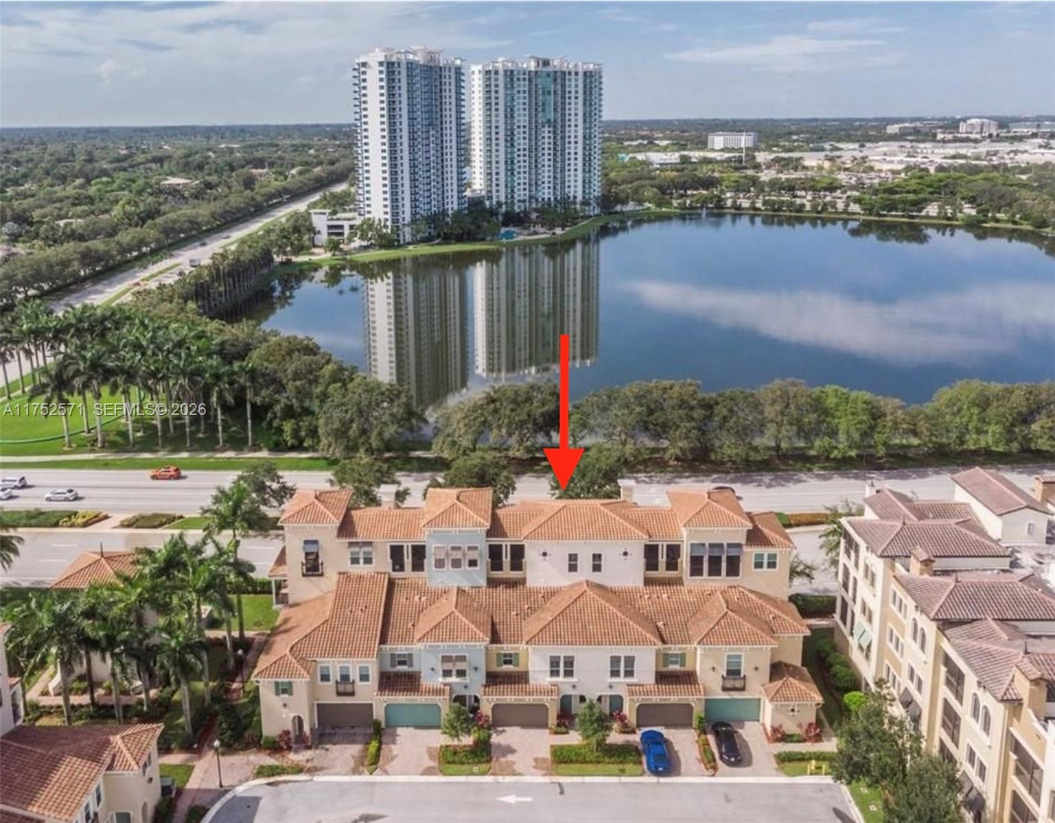 Huge 2900+ SF RARELY AVAILABLE Modern Sky Villa Plan w/no visible neighbors just light filled lake views from all levels of this 4 bedroom, 3.5 bath home w/a full-sized 2-car garage, a sunny lake facing patio plus a large covered 4th floor Sky Deck, perfect to transform into your dream outdoor kitchen. The open entry level floor plan living area boasts a large chefs island kitchen w/a gas stove & newer Stainless Steel appliances. A wall of impact doors & windows floods this level w/sunlight! Step out to enjoy guard gated Artesia's luxurious clubhouse, water features, gym, pickle ball, tennis courts, pools, kids playgrounds, parks & HOA currently includes even Wi-Fi & Cable! * EASY SHOWINGS * MOTIVATED SELLER * PRICE REDUCED $50k TO BELOW RECENT ARTESIA SALES *