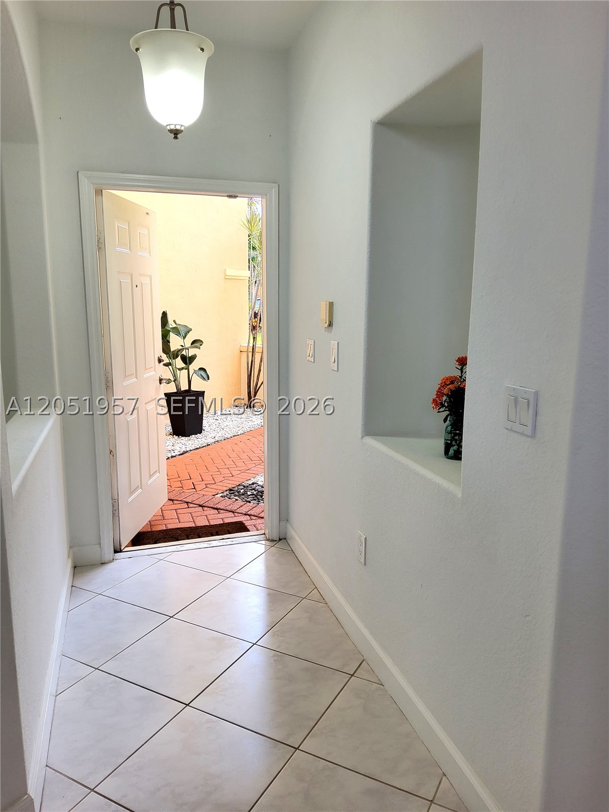 DORAL SOUTHEAST PATIO-HOM - Residential Lease
