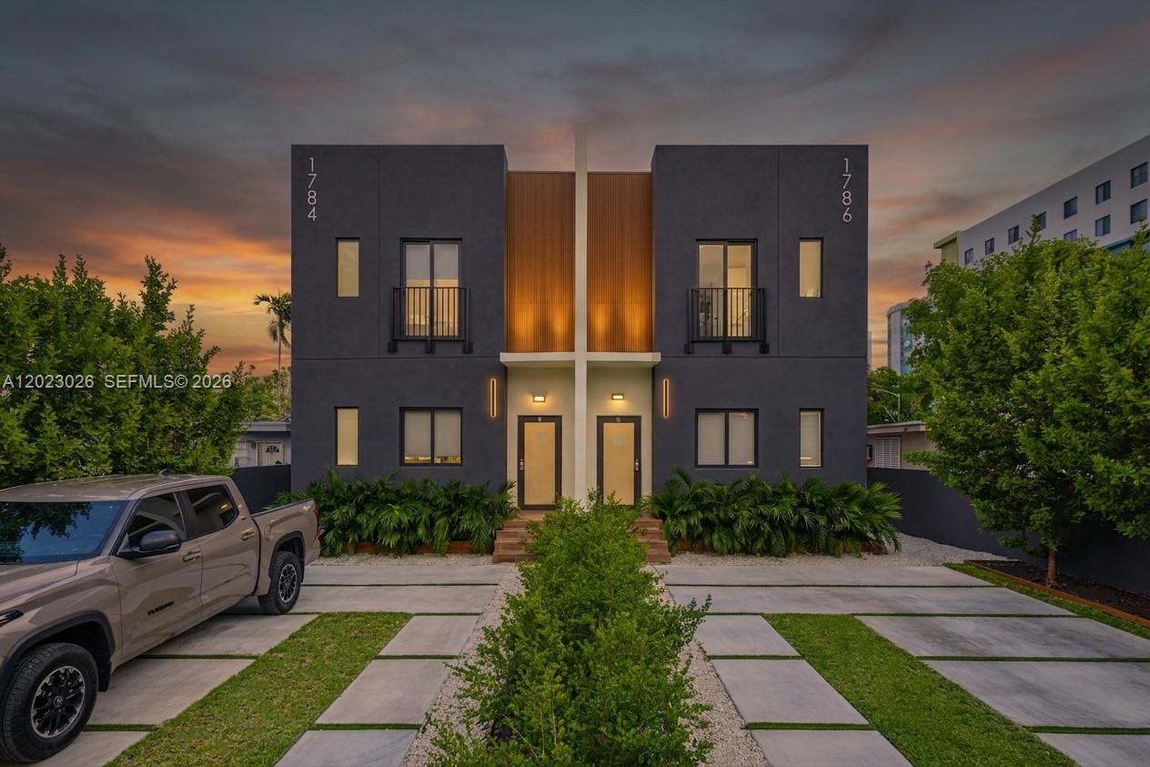 This beautiful duplex, completed in 2025, is currently operating as a FOURPLEX. The property features TWO SPACIOUS 4-BEDROOM/3-BATHROOM UNITS AND TWO STUDIOS, for a total of 10 bedrooms and 8 bathrooms, each with its own independent entrance, making this an exceptional investment opportunity for all types of investors. Centrally located with easy access to major highways, Wynwood, the Design District, and Downtown Miami. The property is fully leased to a single tenant, generating FIVE-FIGURE MONTHLY INCOME. Each unit also has its own separate A/C system. PLEASE DO NOT DISTURB THE TENANT. A virtual tour of the property is available upon request. The seller is offering a portfolio of properties in the area; please contact the listing agent for additional information.