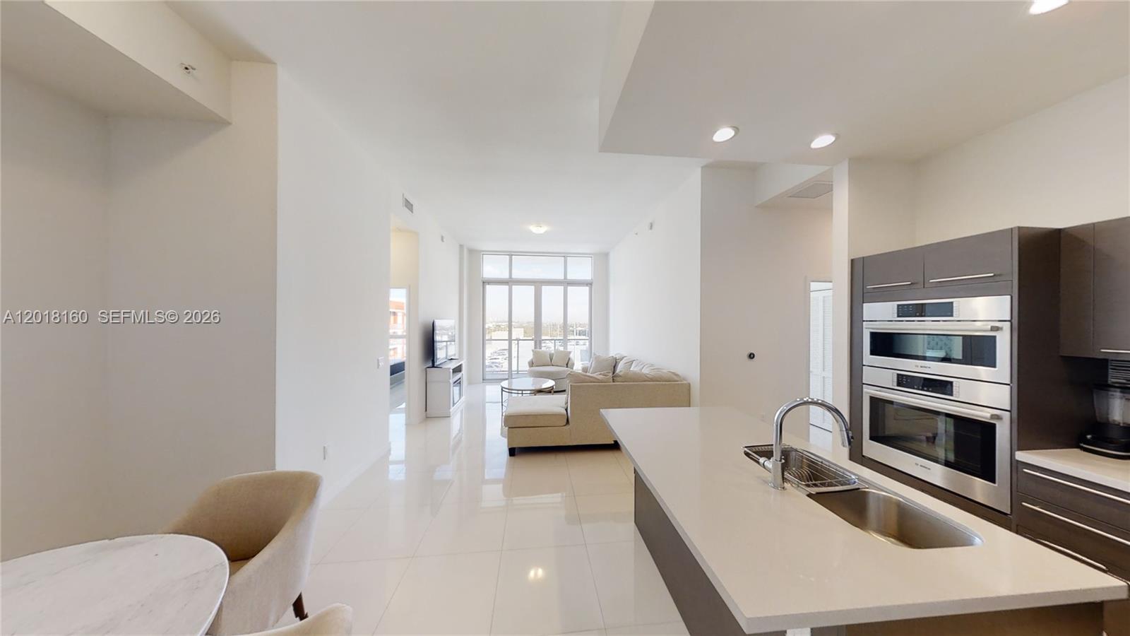 Penthouse at Midtown Doral! 2BR/2BA with 1,130 SF + terrace. Porcelain floors throughout, modern kitchen with quartz countertops and stainless steel appliances, and 2 assigned parking spaces. Located in the vibrant Midtown Doral with shops, dining, and supermarkets within walking distance. 24-hour security and resort-style amenities.