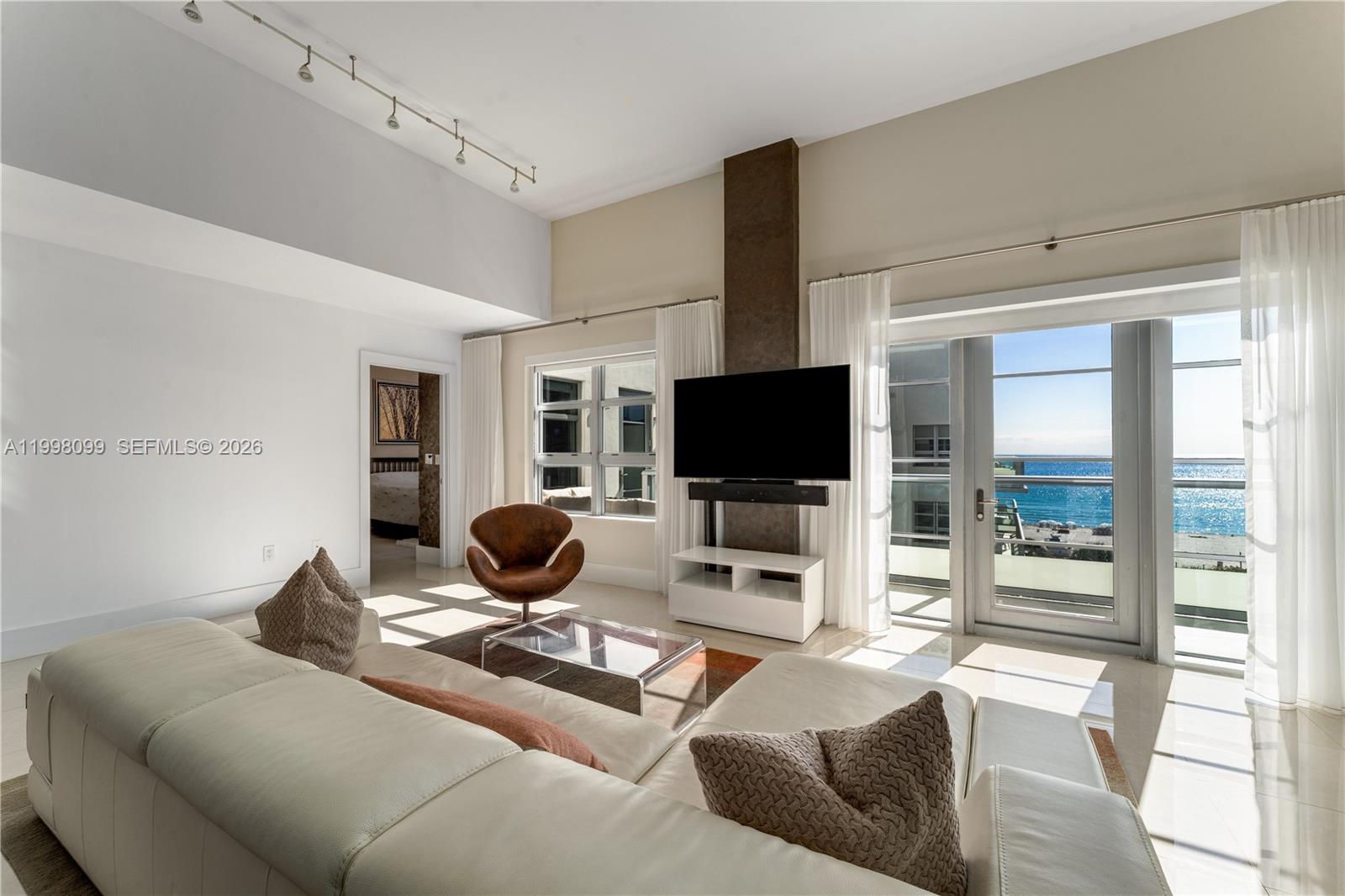 Step into a coastal retreat where luxury meets imagination at Caribbean N-604. With a total of 1,302 livable SF, this elegant 1-bedroom, 1.5-bath primary residence offers ocean filled sunrises with beach views, refined living space, and crowned by a designer-ready private rooftop terrace with a private cabana (1 bed/1 bath) — your own sanctuary in the sky for sunset gatherings and starlit evenings. Inside, light-filled living spaces flow effortlessly, creating a sense of calm and sophistication. Upstairs, the nearly 1,000 sf private rooftop terrace becomes an extension of your lifestyle—ideal for entertaining or simply unwinding above the rhythm of Miami Beach. Residents enjoy resort-style amenities including private beach service, pool and spa, fitness center, sauna, and exclusive cigar and wine rooms with dedicated owner storage as well as 24/7 front desk concierge and valet parking. Perfectly positioned along Collins Avenue, you are moments from iconic destinations including the The Miami Beach EDITION, Faena Hotel Miami Beach, Aman Miami Beach, Soho Beach House, and Fontainebleau Miami Beach—placing world-class dining, nightlife, and culture just beyond your door. A rare opportunity to live where every day feels like a getaway.