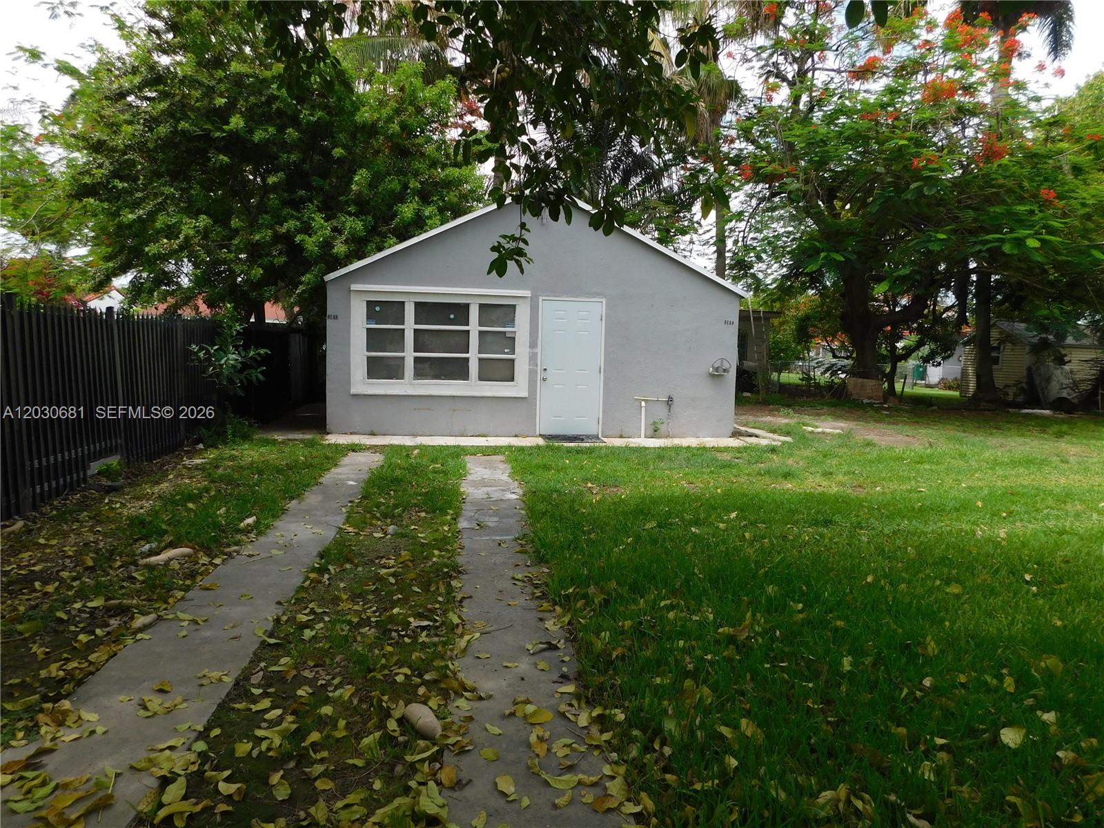 Great location for this Apartment in the rear of the house, consists of 2 bedrooms, 1 bath with kitcken and small dining area. fully remodeled with ceramic floors and remodeled bathroom,  3 mini splits to cool the apartment. For $2,300 dollars utilities are included. Water, electricity, lawn, and trash removal. the property has a large backyard and plenty of space to park 3-4 cars inside the house. Unit is vacant and ready to move in. washer and dryer are shared. Don't wait before its gone! We present all Offers.