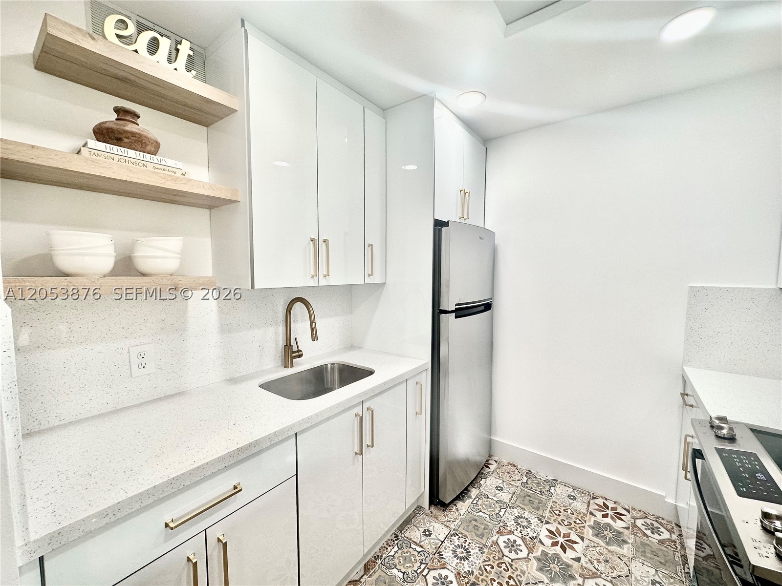 Welcome to this SPECTACULAR, fully remodeled **1-bedroom, 1.5-bath** condo, filled with natural light and located in the prestigious *Century Village Pembroke Pines* 55+ community. This move-in-ready home features a modern open-concept kitchen with elegant cabinetry, stainless steel appliances, beautiful finishes, laminate flooring throughout the main living areas and charming Moroccan-style tile flooring in the kitchen and screened balcony, adding a unique touch of warmth and character. Both bathrooms have been tastefully renovated with contemporary finishes, creating a fresh, sophisticated, and inviting living space.
Unwind on your private screened balcony while enjoying breathtaking golf course views—the perfect place to start your morning with a cup of coffee. Located in a well-maintained building with wonderful neighbors, this residence offers the perfect blend of comfort, style, and peaceful living.
Experience the exceptional lifestyle of Century Village Pembroke Pines, one of South Florida's premier active adult communities. Residents enjoy an impressive clubhouse, state-of-the-art fitness center, indoor and outdoor swimming pools, tennis and pickleball courts, golf course, theater, library, courtesy transportation, countless social activities, and an outstanding selection of resort-style amenities.
**Don't miss this rare opportunity to own a truly turnkey home in one of Pembroke Pines' most sought-after 55+ communities. Schedule your private showing today!**
