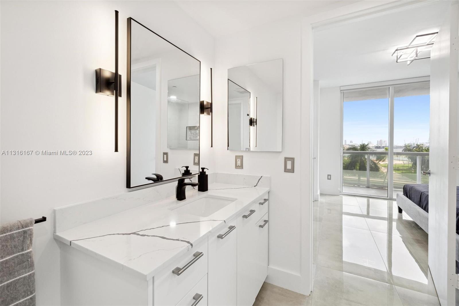 Amazing Spacious Furnished Park Suite Corner Unit.  This newly renovated 1 bedroom PLUS den with wrap around balcony, is fully updated with NEW – Bathroom, Porcelain Tile Flooring (inside and out), A/C, Custom Closet, Window Treatments, W/D, and more. Low Maintenance Fees.  Best Location, ideally located right across from Bayfront Park (10 mins to MIA airport, South Beach, I-95, Brickell, Design District, Coconut Grove).  Walk to acclaimed restaurants, Whole Foods, Shopping and Entertainment.  First-class amenities including Olympic sized pool, state of the are spa, private fitness center, valet parking and concierge services.  Unit is permitted to be rented up to 12 times per year for a perfect mix of investment and/or personal use.  Don’t miss out on this INCREDIBLE opportunity.
