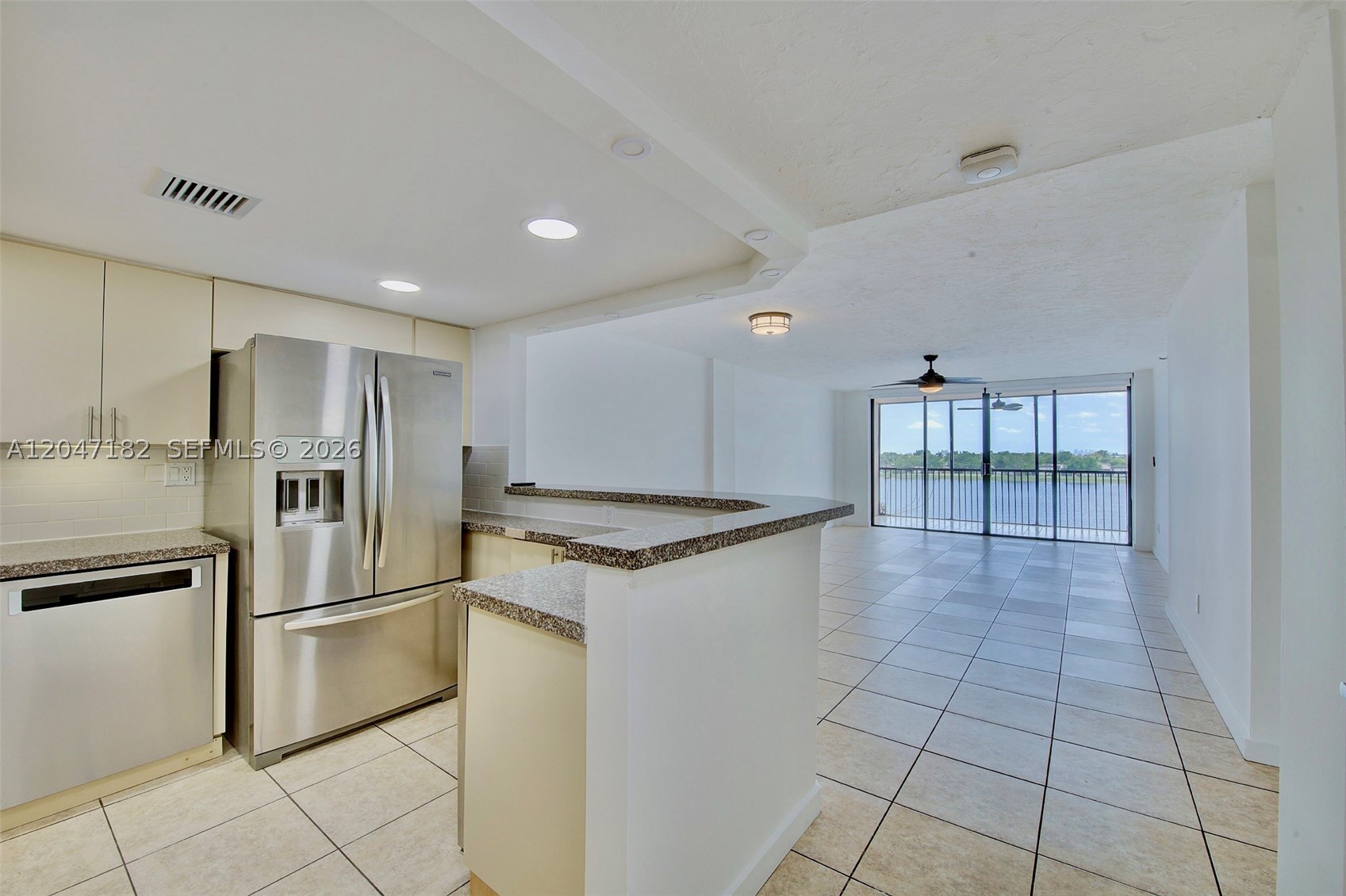 Amazing one of a kind almost 1600 sq ft water-view apartment. Updated kitchen and both bathrooms, new vinyl floors, top of the line kitchen appliances and washer/dryer tower. Gorgeous view: you can see the downtown of Miami and Sunny Isles from the very large balcony and from the master bedroom. Nest thermostat and safe electronic lock. Gated and very quite community. Beautiful pool and walking area around the building. First, last and security to move in. Please, call or text agent for the showing instructions.