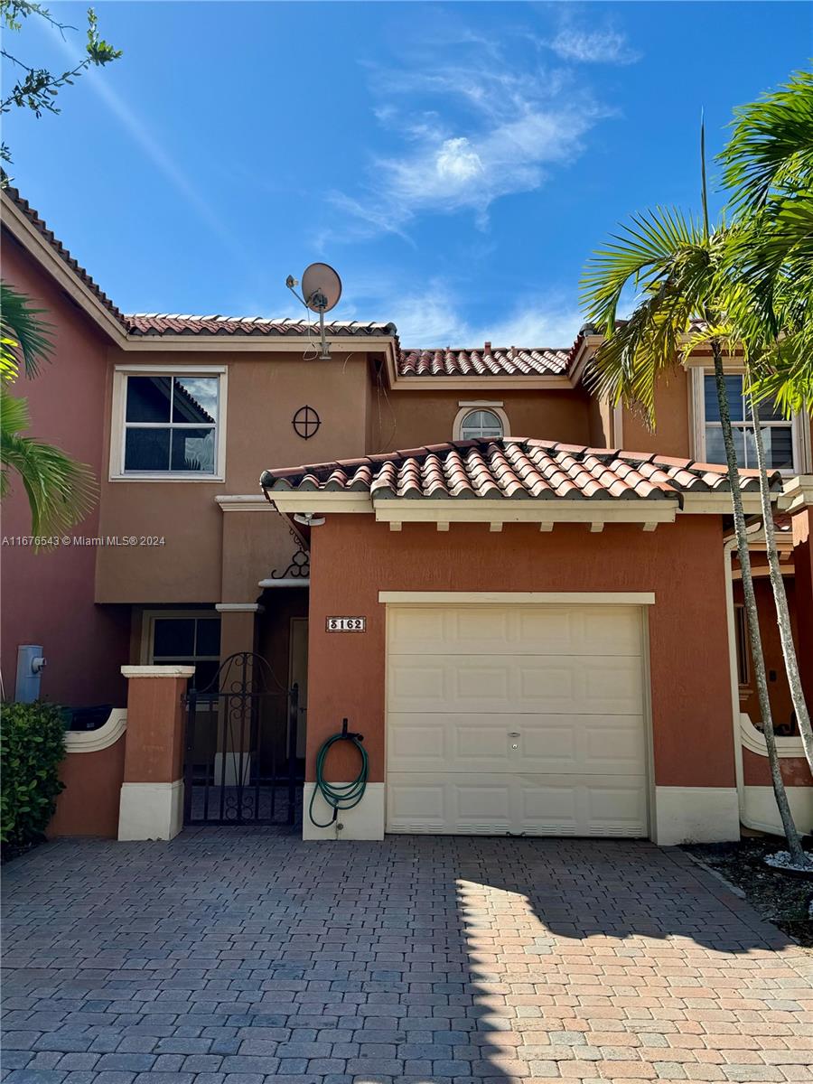 Welcome to the desirable Verona at Venetian Isles, this beautiful and spacious 2 beds, 2.5 bath townhouse is ready to welcome you as is newest resident! This property has been meticulously maintained and features generous living areas, a private backyard, stainless steel appliances, marble countertops, tile flooring downstairs, wood laminate flooring upstairs, plenty of closet spaces,  full size washer and dryer, new AC, a one car garage and more! Close to the Venetian Isles Club House with resort style amenities including beautiful pool/jacuzzi, lakefront gazebo, children's playground, and beach volleyball.