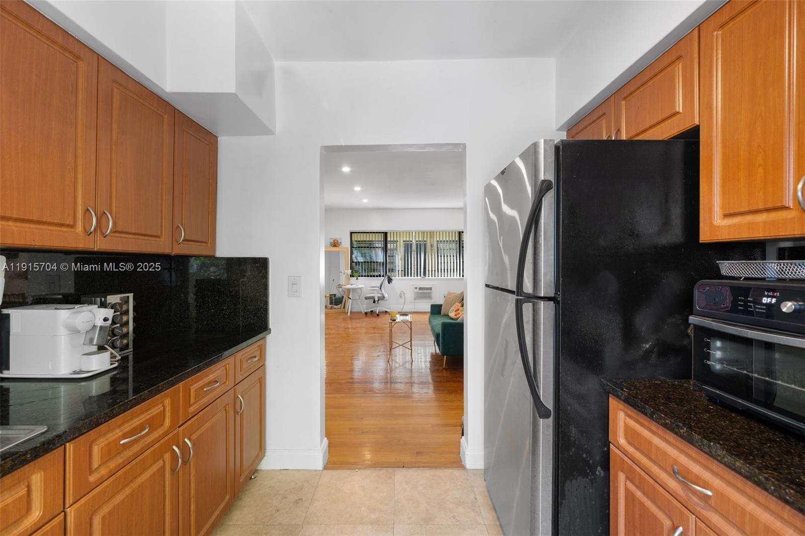 TUDOR HOUSE CONDO - Residential