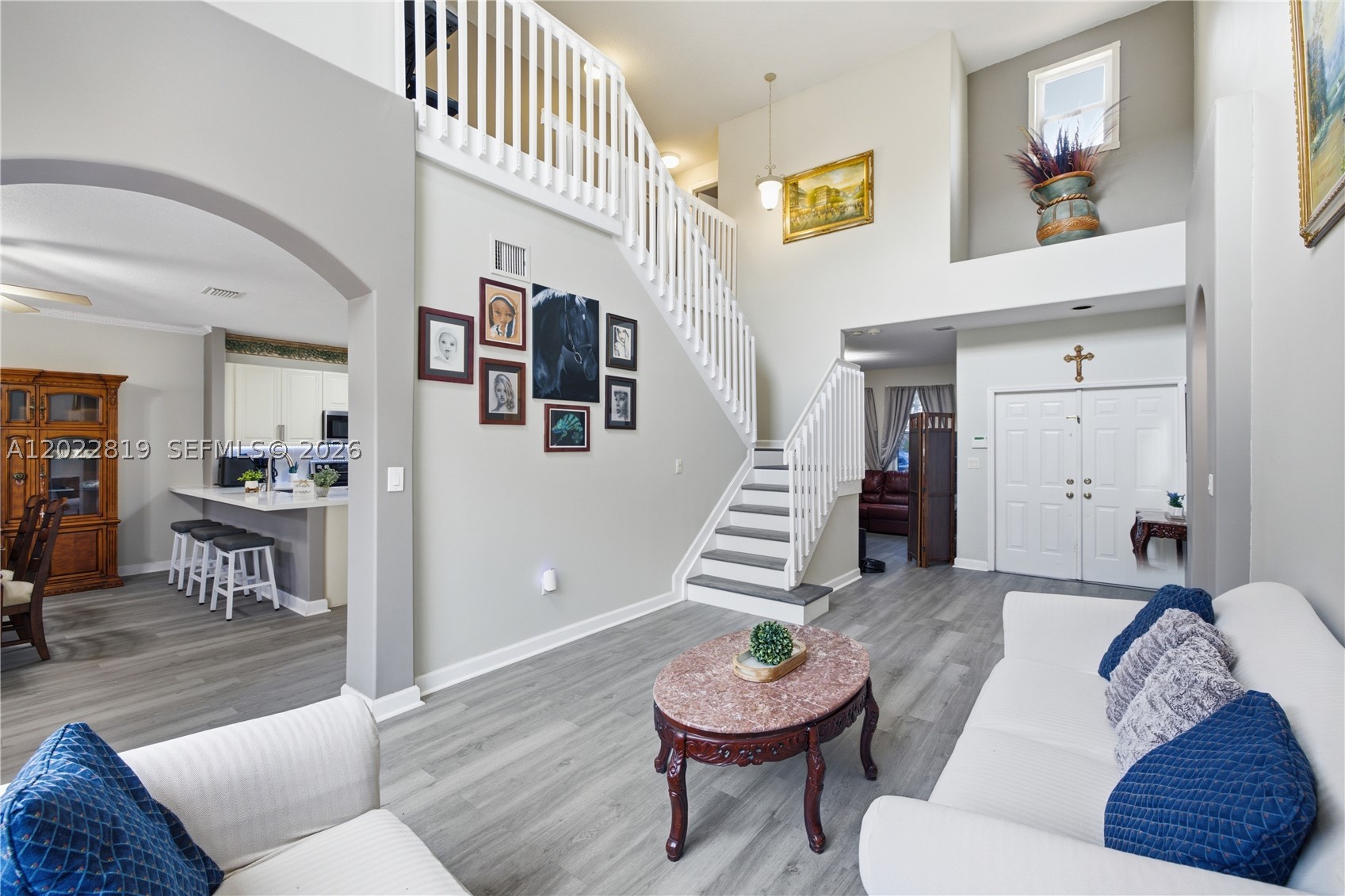 Beautifully updated home in the highly desirable gated community of Nautica! This bright and welcoming two-story residence features 3 bedrooms, 2.5 bathrooms, a 1-car garage, and one of the largest fenced patios in the community. The spacious floor plan offers separate living and dining areas, new waterproof vinyl flooring throughout both levels, and a renovated kitchen with stainless steel appliances, quartz countertops (2025), and ample prep space. The primary suite features custom closets and an upgraded double sink master bathroom.
Recent improvements include a new A/C compressor (2025), tankless water heater (2025), impact windows, updated second-floor, quartz kitchen counters (2025), and washer and dryer approximately 3 years old.
Enjoy outdoor living in the oversized backyard featuring mature fruit trees including avocado, lemon, mandarin, and papaya, plus a charming children's playhouse—perfect for entertaining family and friends.
The HOA includes basic cable, sprinkler system maintenance, exterior common area maintenance, 24-hour security patrol, and resort-style amenities including a clubhouse, large community pool, children's pool, fitness center, tennis courts, basketball courts, and playground. Ideally located near top-rated schools, shopping, dining, regional parks, and major highways for easy commuting. A true move-in ready opportunity in one of Miramar's most sought-after communities!