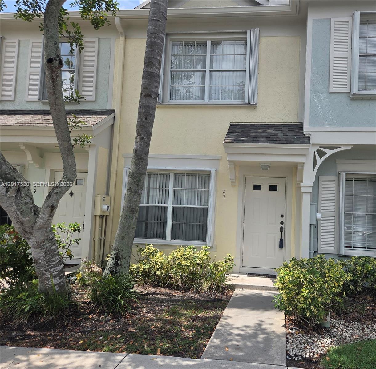 SUPER CLEAN 2/1.5 TOWNHOME LOCATED IN COCONUTS AT BONEVENTURE. INVESTOR FRIENDLY! RENT RIGHT AWAY WITH NO HOA APPROVAL REQUIRED! LOW HOA FEES IDEAL FOR FIRST TIME BUYERS. BASIC CABLE, LANDSCAPING AND EXTERIOR MAINTENANCE INCLUDED. "A" RATED SCHOOLS TOO! KITCHEN HAS NEWER SS APPLIANCES, WASHER/DRYER AND A BRAND NEW OVER THE STOVE MICROWAVE WAITING TO BE INSTALLED BY THE BUYER. TILE FLOORS ON FIRST FLOOR AND WOOD FLOORS ON STAIRS AND SECOND FLOOR. NEWER A/C, NEW ELECTRICAL PANEL AND NEW ROOF IN 2024! FULL ACCORDION SHUTTERS MAKE STORM PREPARATION A BREEZE. SCREENED PATIO OFF KITCHEN WITH EXTRA STORAGE CLOSET A PLUS! ASSIGNED PARKING SPACE RIGHT IN FRONT OF YOUR DOOR WITH PLENTY OF GUEST PARKING AVAILABLE. OCCUPANTS WILL ENJOY MEMBERSHIP AT THE BONEVENTURE TOWN CENTER CLUB OFFERING RESORT STYLE AMMENITIES FOR A MINIMAL REQUIRED ANNUAL FEE. THIS TOWNHOME IS PRICED TO SELL FAST! SO...HURRY!