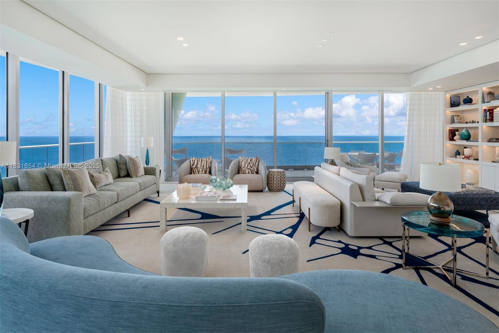 One of Miami's most spectacular condos, Fendi Chateau #1101 is an ocean front masterpiece. Designed & decorated by renowned Brazilian architect Sig Bergamin, this 5bed/6.5 bath 6,726 SF home in the sky exudes beachfront elegance. Perfectly situated taking up the entire north corner, the 1,885 SF wraparound terrace allows for spectacular ocean & intracoastal views.  Exquisite interior features include 10' ceilings, teak flooring, Italian Calacatta stone, & smart home system. The oversized primary suite has dual ocean view bathrooms & a closet the size rarely seen in new construction. The Fendi designed eat-in-kitchen is equipped with Gaggenau appliances & wine fridge. A private elevator opens to elegant living areas, formal dining room, & a media lounge perfect for billiards & game night.