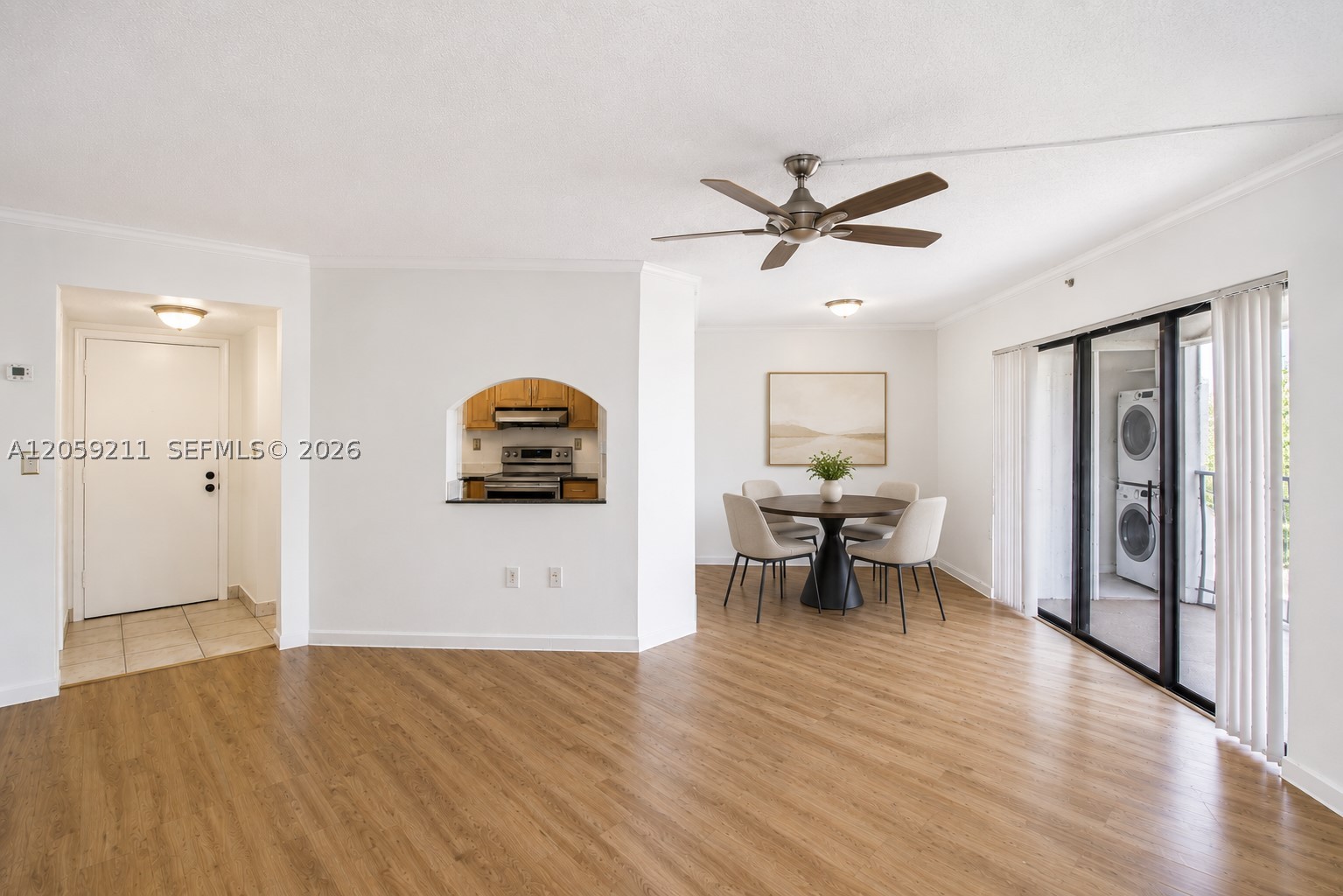 Lowest price in the community!! Welcome to this beautifully maintained 1-bedroom, 1.5-bath corner condominium offering comfort, convenience, and an abundance of natural light. The spacious floor plan features Pergo wood flooring throughout the living area and bedroom, an in-unit washer and dryer, and a screened balcony—the perfect spot to relax and enjoy the Florida breeze. Residents enjoy access to community amenities, including a swimming pool, clubhouse, and fitness center. Ideally located near parks, hospitals, shopping, dining, and major highways, this home offers an easy commute and everything you need just minutes away. Schedule your showing today!