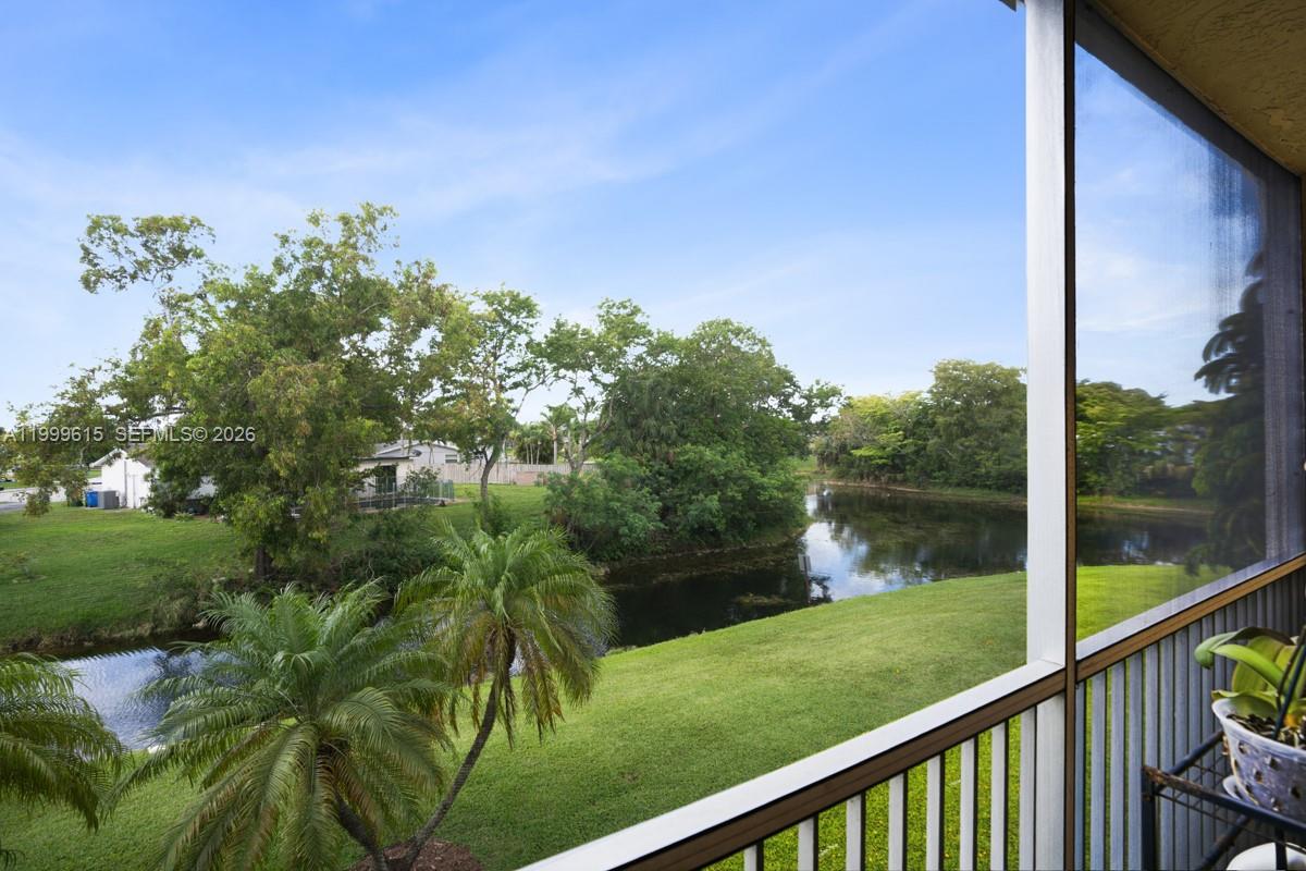 Located in a desirable 55+ community in Margate, this well-maintained condo offers comfortable and low-maintenance living. The bright and inviting layout features a spacious living and dining area filled with natural light, along with a screened balcony overlooking peaceful canal views.  The unit includes a generously sized bedroom, ample closet space, and a functional kitchen ready for your personal touch. Residents enjoy a vibrant community lifestyle with amenities that include a clubhouse, pool, tennis courts and more. Conveniently located near shopping, dining, and major roadways, this property is ideal for year-round living or a seasonal retreat.