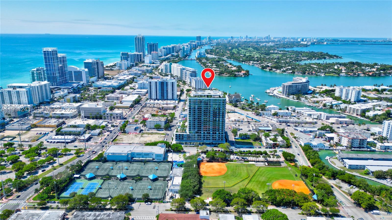 Amazing Brand New (Never lived or used) Luxury living at this exceptional 22-story LEED Gold Certified building in Miami Beach, 2 Bedrooms & 2 Bathrooms with modern layouts and expansive private balconies. Perfectly situated blocks from the beach and approved for short-term rentals, the property features a grand double-height lobby, advanced smartbuilding technology, and resort-style amenities. Enjoy a 150-foot pool with cabanas, a fitness center, yoga lounge, kids’ playroom, and multiple dining venues. Residents benefit from a private rooftop with panoramic views, a golf cart shuttle to the beach, and lifestyle concierge services. Each residence comes fully furnished with floor-toceiling glass doors, high ceilings, and breathtaking views of the ocean, park, and skyline.