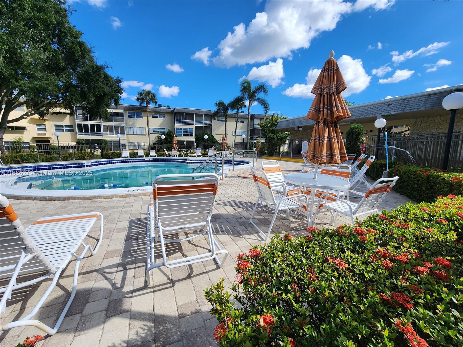 EXCELLENT PRICE ~ BUILDING PASSED 50-YEAR CERTIFICATION.  RENT THE FIRST YEAR 2X/YR. NO YEARLY RENTALS. 750 credit score required. Fun 55+ community. Make this Condo Yours Today! ~ Close To Everything! This First Floor 2 Bedroom, 2 Bath Condo's Screened Porch Opens to The Heated Pool, Shuffleboard, Community Room and BBQs. ~ Property Amenities Include, 2 Heated Pools, Community Rooms, Large Gazebo w BBQ Grills, Billiards, Ping Pong, Garden BBQ Area, Walking Garden Paths. Parking Space #62 Just Outside the Front Door.