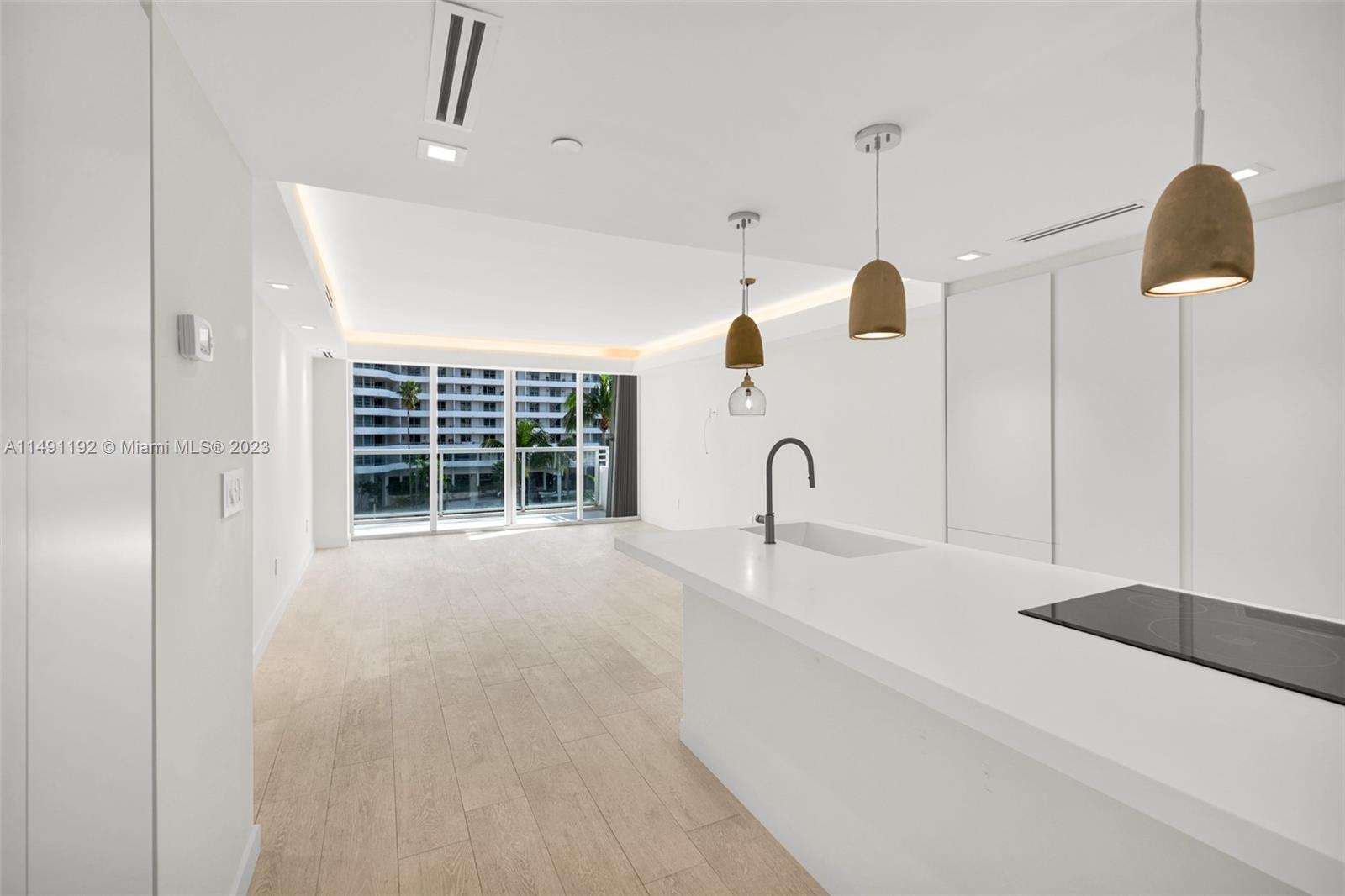 Experience luxury on Millionaire's Row with this exclusive renovated condo. The open kitchen boasts modern upgrades with Thermador range and Bertazzoni appliances, and the sizable bedroom features two built-in closets and ocean views. Convenience is key with an in-unit washer/dryer, valet parking, and beach access close by. The living room is spacious and well-lit, and the bathroom is immaculate. Enjoy the peace of mind of 24hr concierge, security, and valet parking. Access to a top-notch 3,000 sq ft fitness center, and a heated Olympic pool. This iconic building houses Café Bernie a gourmet restaurant, business center, and game room. Don't miss the chance to live in luxury—schedule your showing now and discover upscale living in this renowned building! SA is $127.17 & $188.23 monthly.