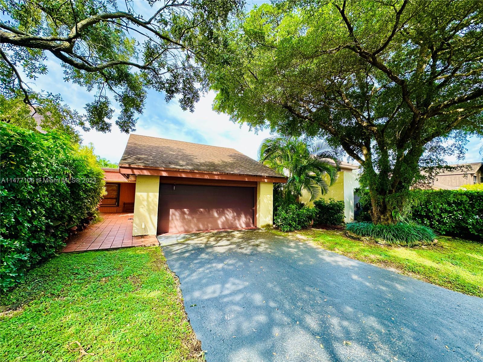 Exceptionally rare unfurnished one story 3/3 single family home in Hidden Oaks. The layout of this Mid Century designed home provides for maximum natural light throughout the house. This well maintained residence features magnificent volume ceilings, stainless kitchen appliances, two car garage and so much more. If entertaining is more your style, the spacious backyard features a pool that affords incredible privacy with minimum 7' high concrete walls all around the property. The community of 71 homes features impeccably maintained landscaping, 24 hour security guard, gazebo, dual tennis/basketball courts and children's playground. Furniture available upon request