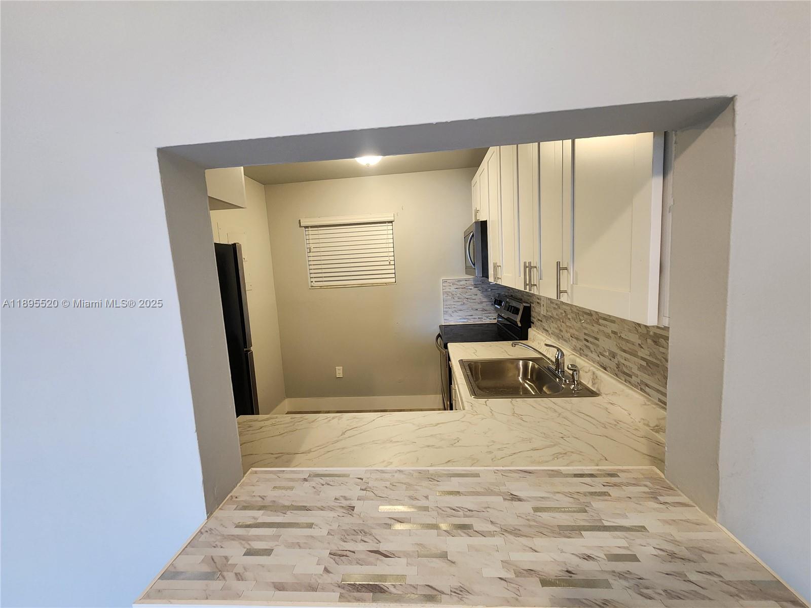 CARIBBEAN GARDENS CONDO - Residential