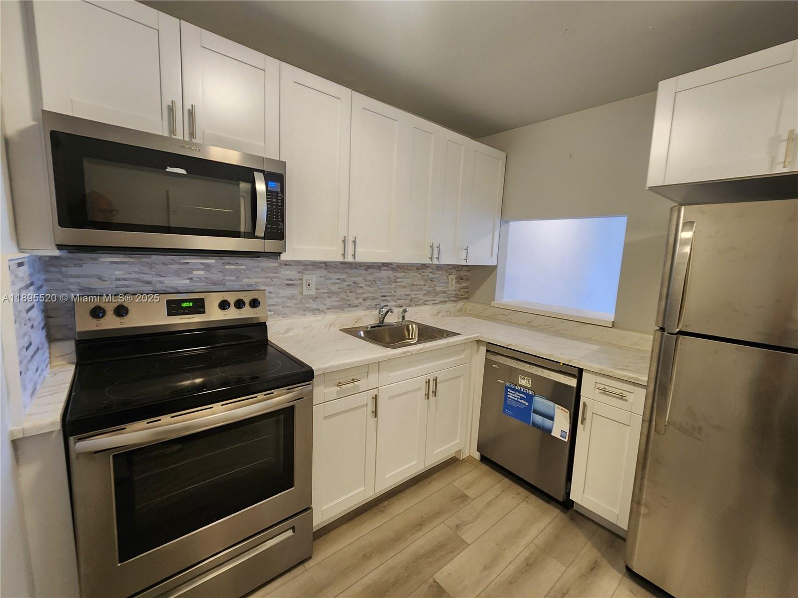 CARIBBEAN GARDENS CONDO - Residential