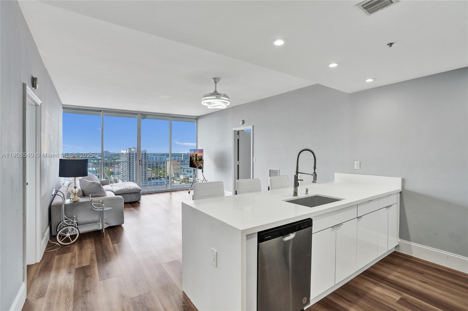 Welcome to Grandview Palace Penthouse Living in North Bay Village: The Heart of the Bay. This freshly renovated 2-bed 2-bath condo features new stainless-steel appliances, designer lighting, modern flooring, and floor-to-ceiling windows framing wide Biscayne Bay sunset views. Resort-style amenities: heated waterfront pool, fitness center, marina access, 24-hour security, and on-site retail. Just over the bridge from Miami Beach, minutes from Midtown and the Design District. Across the street a new Publix is rising, and the AFA Soccer & Pickleball Complex plus the upcoming Island Walk will connect the bayfront with shops, dining, and public access. Discover the ultimate blend of luxury, lifestyle, and location at Grandview Palace, where every evening ends in color and calm over the bay.