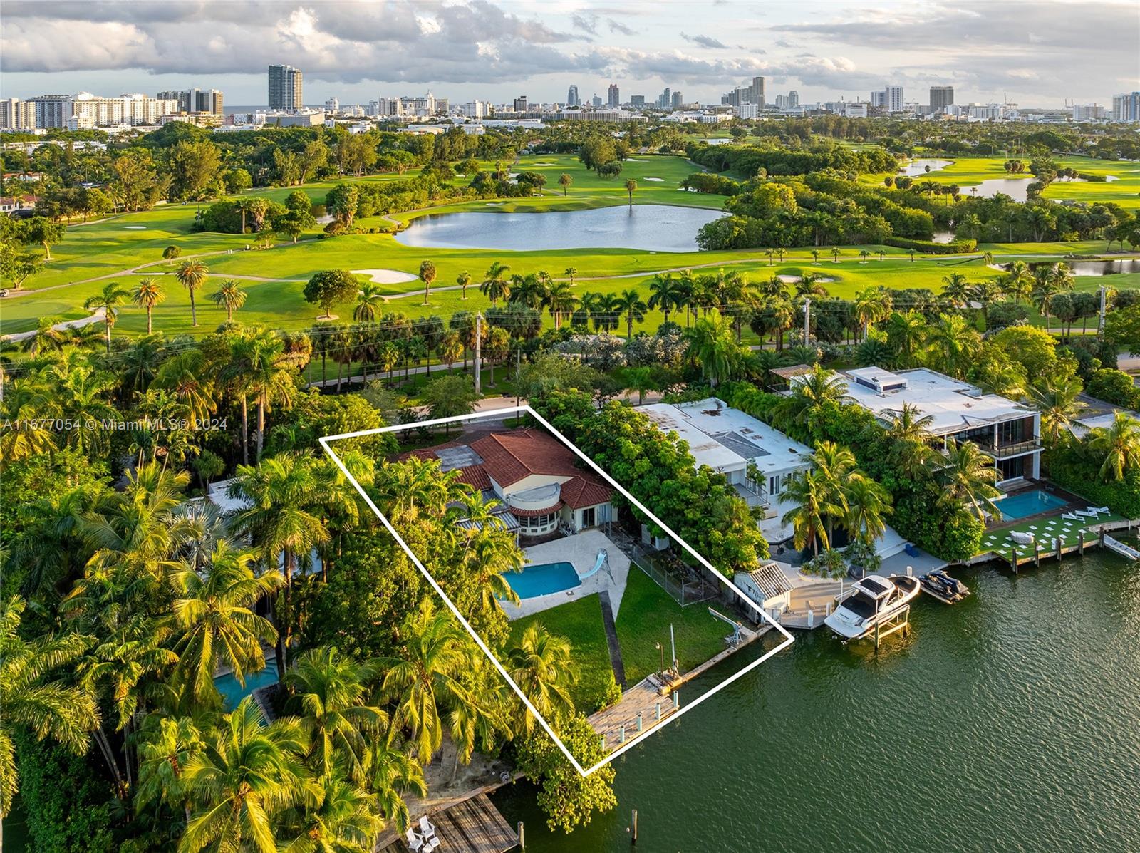 Discover this fantastic opportunity to build your dream home on a generous 15,308-square-foot lot across a golf course with approximately 89 feet of pristine waterfront. This 3-bedroom, 3-bathroom home offers an ideal blend of tranquility and accessibility; the property is centrally located within minutes of Miami’s most sought-after destinations. Enjoy easy access to prime dining, upscale shopping, beautiful beaches, and vibrant cultural and sports venues. Sunset Harbor, downtown Miami, the Design District, and Miami International Airport are all conveniently nearby, making this home perfect for those seeking a family home with unmatched convenience.