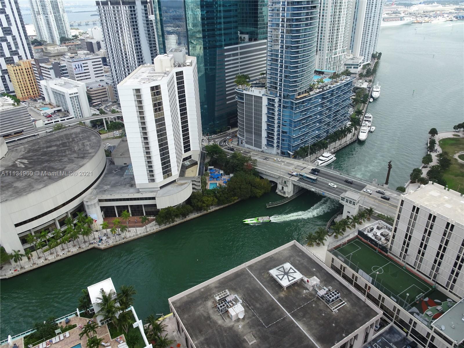 Designers two story loft, large master upstairs with walk-in closet. Floor to ceiling, impact windows giving you great light, and river views. Nice wood floors throughout. Building offers pool area overlooking Miami River, concierge, gym, sauna, steam, racquetball, walking distance to Brickell Village, restaurant's, financial buildings and
more.