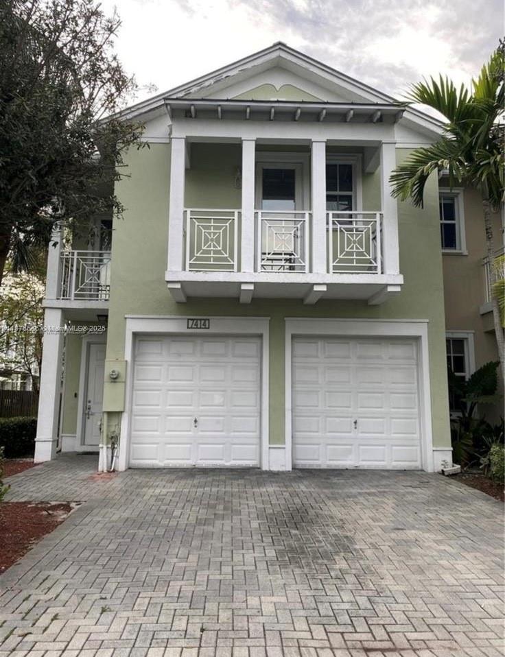 Doral living at its best at the RESERVE gated community . Remodeled 2 story corner home. Gourmet kitchen with stainless steel appliances . Truly ample townhouse with great natural lighting walking distance to park and community pool . 4 bedrooms 3 and 1/2 bath . Plenty of natural light Fla. keys style home.  Private balcony in the master room with 2 more balconies in the other bedrooms. 2 car garage. Family friendly community in a great location of Doral.  Pool, gym, clubhouse and playground all within minutes from shopping; groceries and restaurants !  Just minutes away to major highways and Miami International Airport