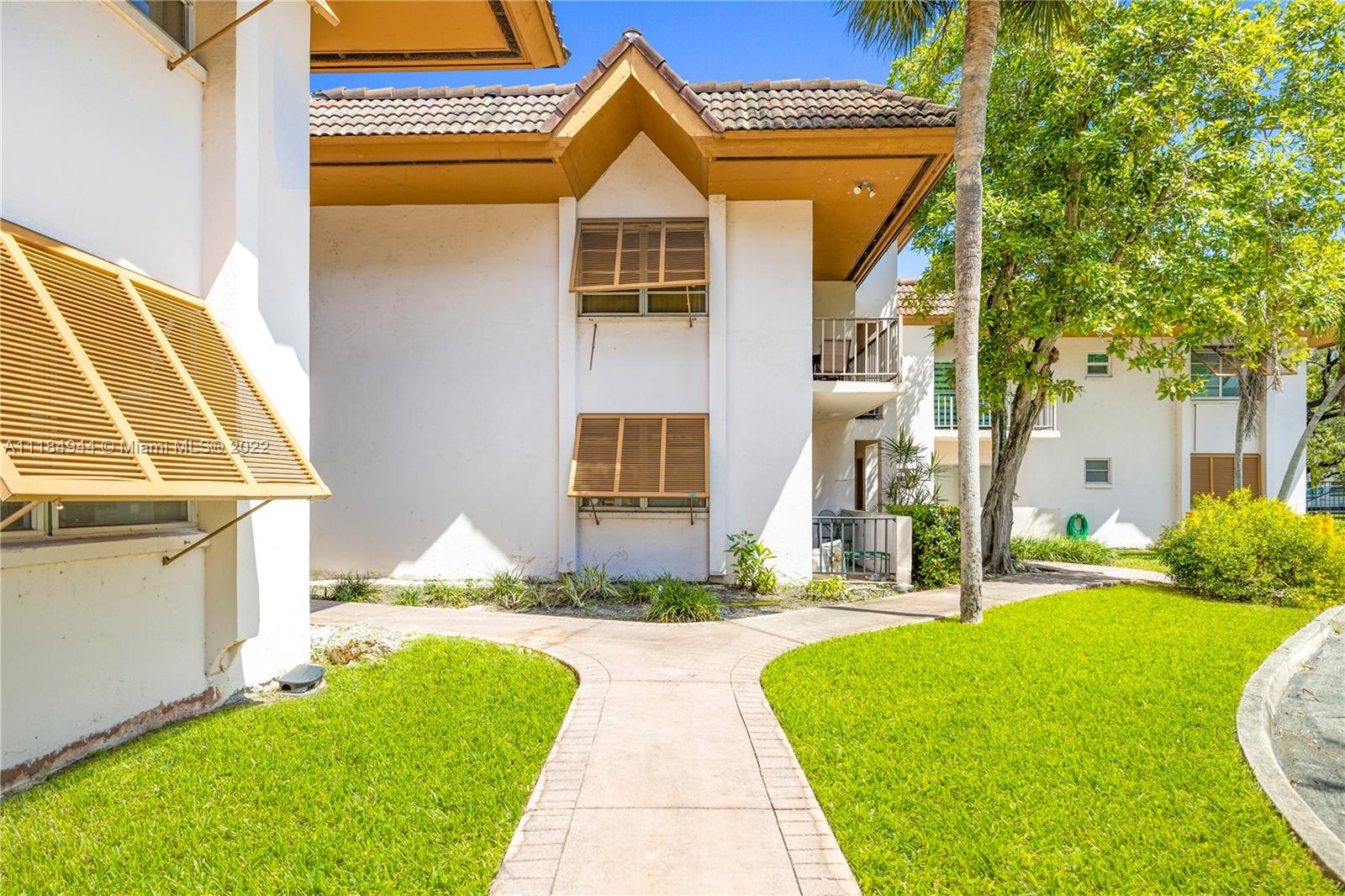 Highly sought-after location, 875 Sq Ft 1/1 Condo, 1st floor with balcony.  The bedroom has a large 8 x 5 walk in closed with built in wood shelving which could be used as an office. The kitchen and bathroom are original.  This gated community has lush landscaping, pool, exercise room, tennis, clubhouse, open parking, storage in building and more.  Walking distance to shopping malls, food stores, parks and restaurants. No Dogs allowed, only indoor cats.