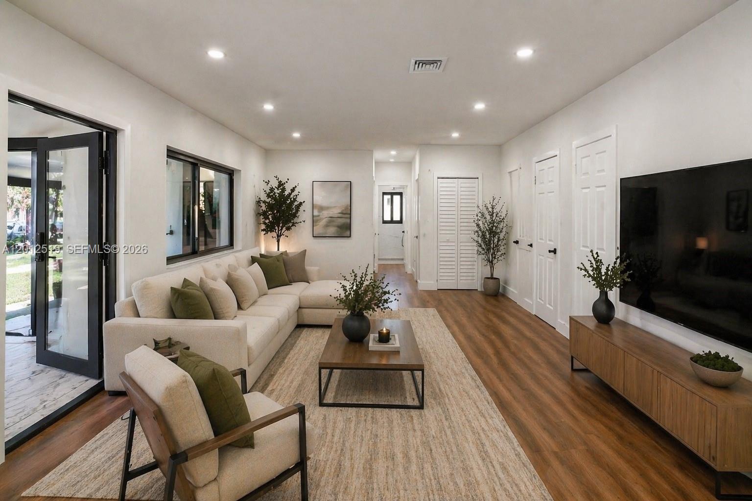 Fully renovated 3-bedroom, 2-bathroom home in North Miami — no HOA, move-in ready, and loaded with upgrades. This stunning property features a brand-new aluminum roof, new HVAC system, updated electrical and plumbing, new impact windows and doors, and hurricane shutters for complete peace of mind.

Inside, enjoy high-end luxury finishes throughout, epoxy flooring, and a custom wood garage door with brand-new garage system. The functional open layout is designed for modern living, while the enclosed patio leads to an additional ~415 sq ft flex space — perfect for a home office, gym, guest suite, or income-producing opportunity (not reflected in tax roll).


Situated on a large lot with room to expand, entertain, or create your dream outdoor oasis. Minutes from major highways, shopping, dining, and the beach. Seller is offering a $2,000 appliance credit at closing so you can choose your preferred kitchen finishes.
Photos are virtually staged**