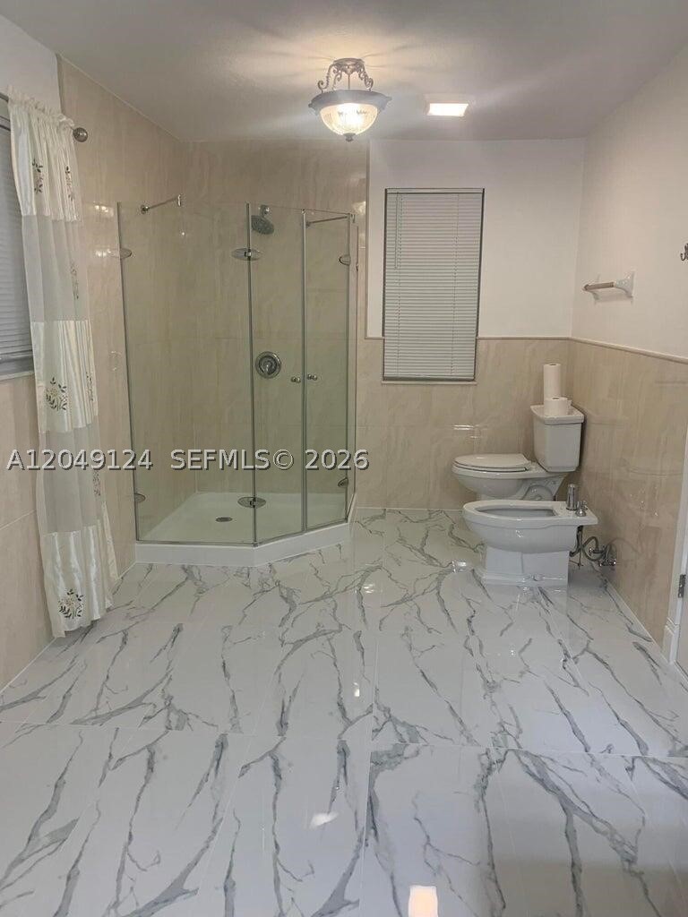 SHOMA HOMES AT TAMIAMI II - Residential