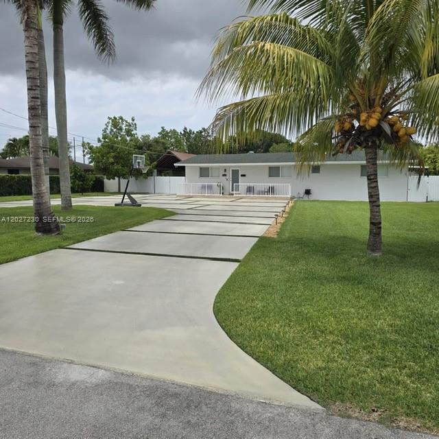 Beautifully remodeled, duplex-like home on quiet neighborhood. Has washer and dryer, private and fenced yard, and plenty of parking. This is a very central location close to schools, restaurants, and shopping. ***Landlord pays for electricity and water bills; they are included in the rent. Landscaping is also maintained by the landlord. ***