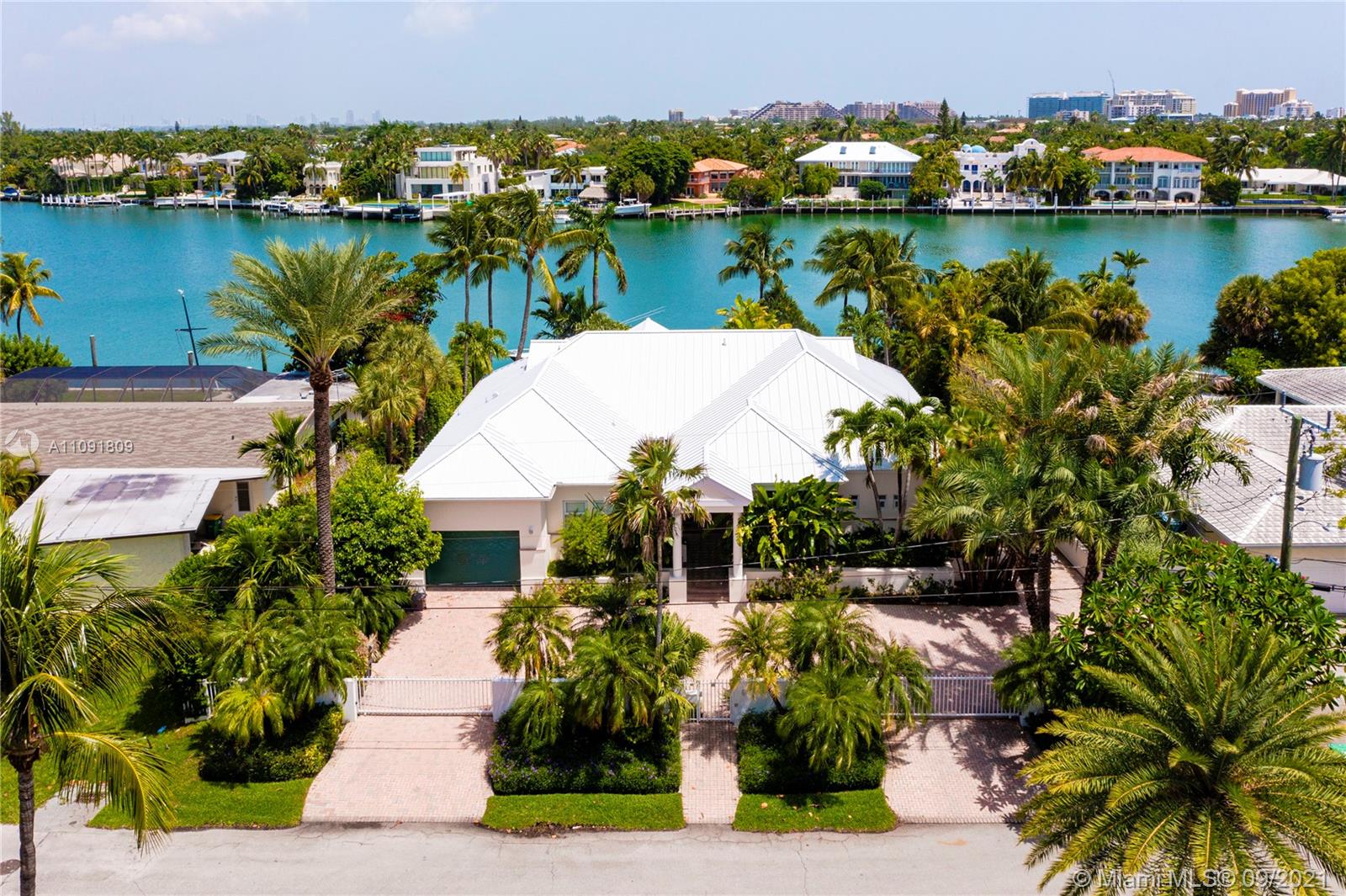 Welcome to one of the most coveted Key Biscayne waterfront locations. Serious Boaters paradise ! 
Mashta island wide water views, glimpse of the city lights…Biscayne bay and tip of Harbor Point.
Gated, 1 story elevated residence, Elegant & easy floor plan. All 3 bedrooms en suite, Master suite overlooks Hurricane Harbor. Large reception area w/ high ceilings, double door impact glass opening to large covered terrace overlooking Hurricane Harbor, w/ direct access to pool, garden and dock. Adjacent to living room area:elegant library w/ powder room & formal dining area. Enclosed kitchen w/direct access to dining room.
Staff quarters 1/1.  1 car enclosed garage. Broker remarks for 3 D & floor plan, Unbranded virtual tour w/ Matter port .