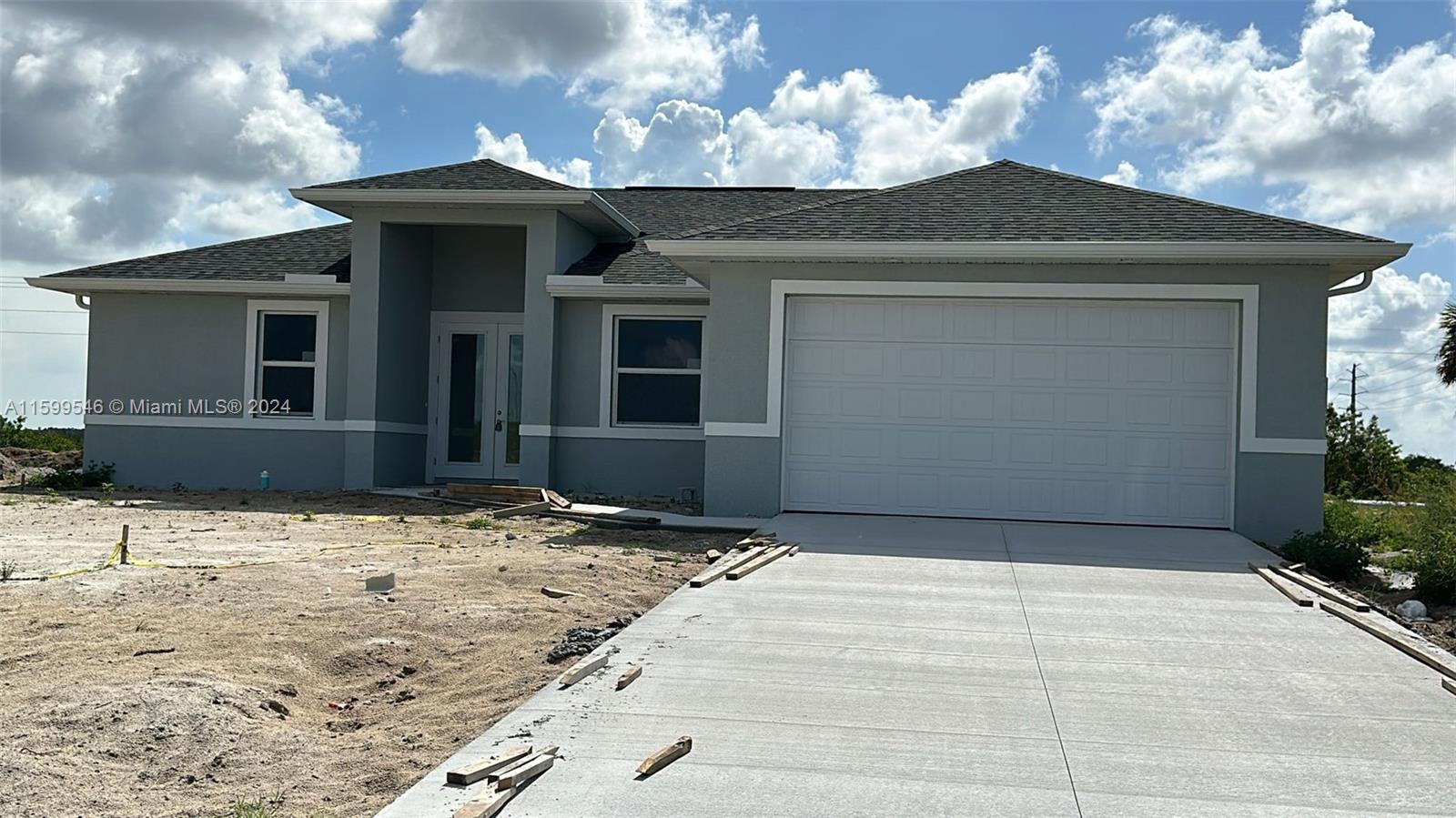New construction beautiful 4 BEDROOMS, ~THE 4TH BEDROOM IS A LARGE SIZE OFFICE ~ 2 BATHROOMS to be estimated completed 2023. This home was designed modernly with a lot of features: Tray ceilings, lanai under truss, impact resistant windows and doors, all tile floors, floor to ceiling tiled master shower, 8’ interior doors, 9'4" ceiling high, Stainless steel appliances, Automatic garage door opener, ceiling fans in bedrooms and great room, irrigation system, gutters at the front, a nice size laundry room with a sink near the garage.
