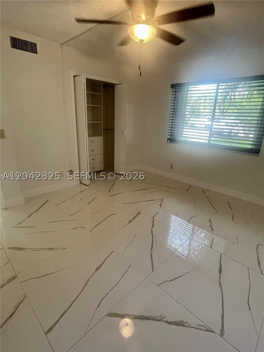 RACQUET CLUB APARTMENTS A - Residential Lease