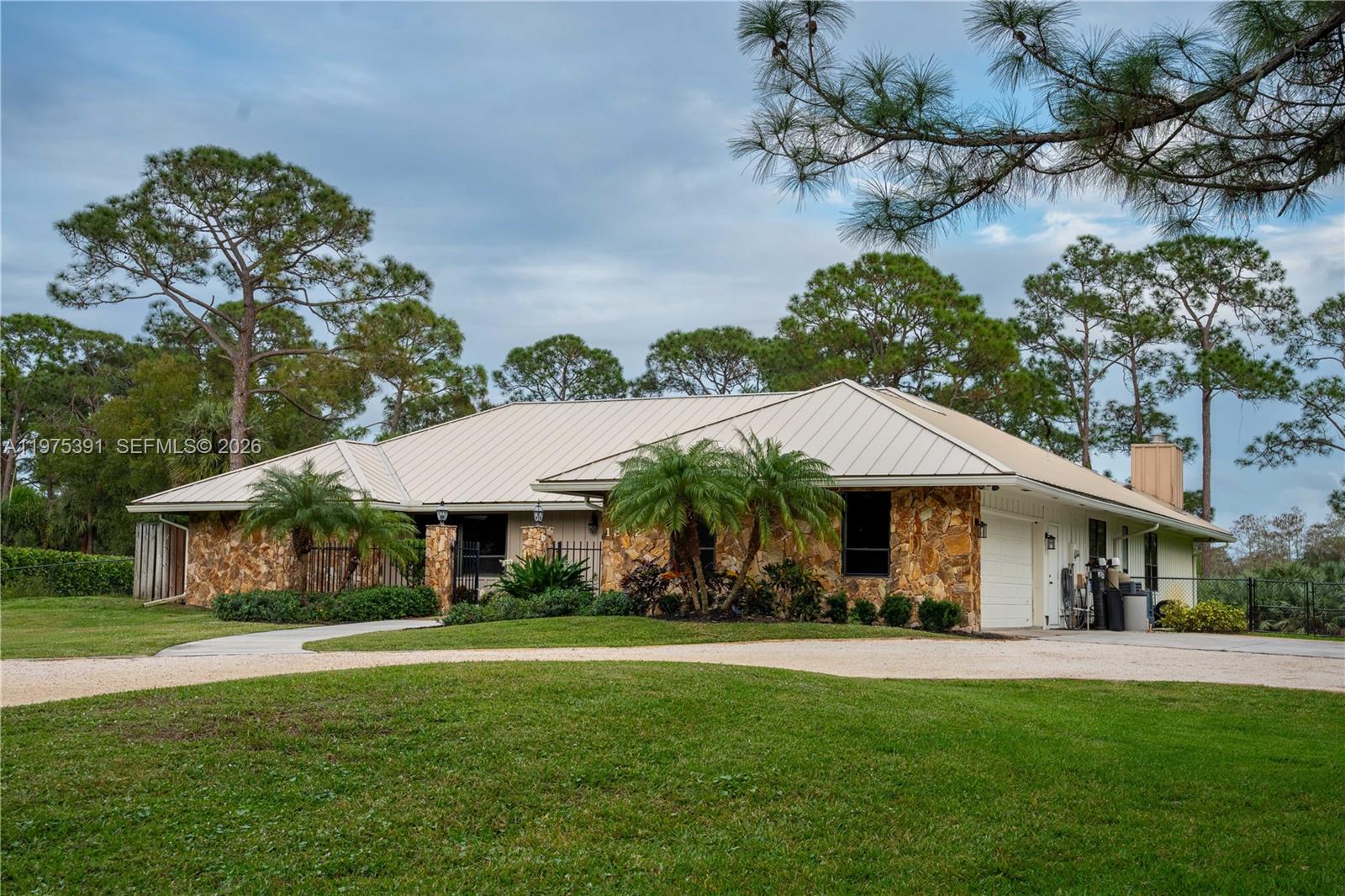 Welcome to 1872 SE Colony Way, the original model home of prestigious Ranch Colony and a rare opportunity to own a piece of the community’s history. Perfectly positioned on the 10th hole of the exclusive Dye Preserve Golf Club, this exceptional residence offers privacy, elegance, and breathtaking golf course views in one of Martin County’s most sought-after gated enclaves.

Designed with entertaining and family gatherings in mind, this home features expansive living spaces, seamless indoor-outdoor flow, and a layout that invites connection. Whether hosting holiday celebrations, sunset dinners overlooking the fairway, or relaxed weekends with family and friends, every space was thoughtfully crafted to accommodate both intimate moments and grand occasions.

As the original model home, the property showcases timeless design elements and an intentional floor plan that maximizes both functionality and ambiance. Large windows frame serene golf vistas, filling the home with natural light and creating a warm, welcoming atmosphere throughout.

Located within Ranch Colony, a private, guard-gated community known for its estate-sized homes and championship golf, residents enjoy tranquility while remaining conveniently close to Jupiter, Stuart, beaches, dining, and major highways.

This is more than a home; it is a legacy property built for gathering, entertaining, and creating lasting memories.