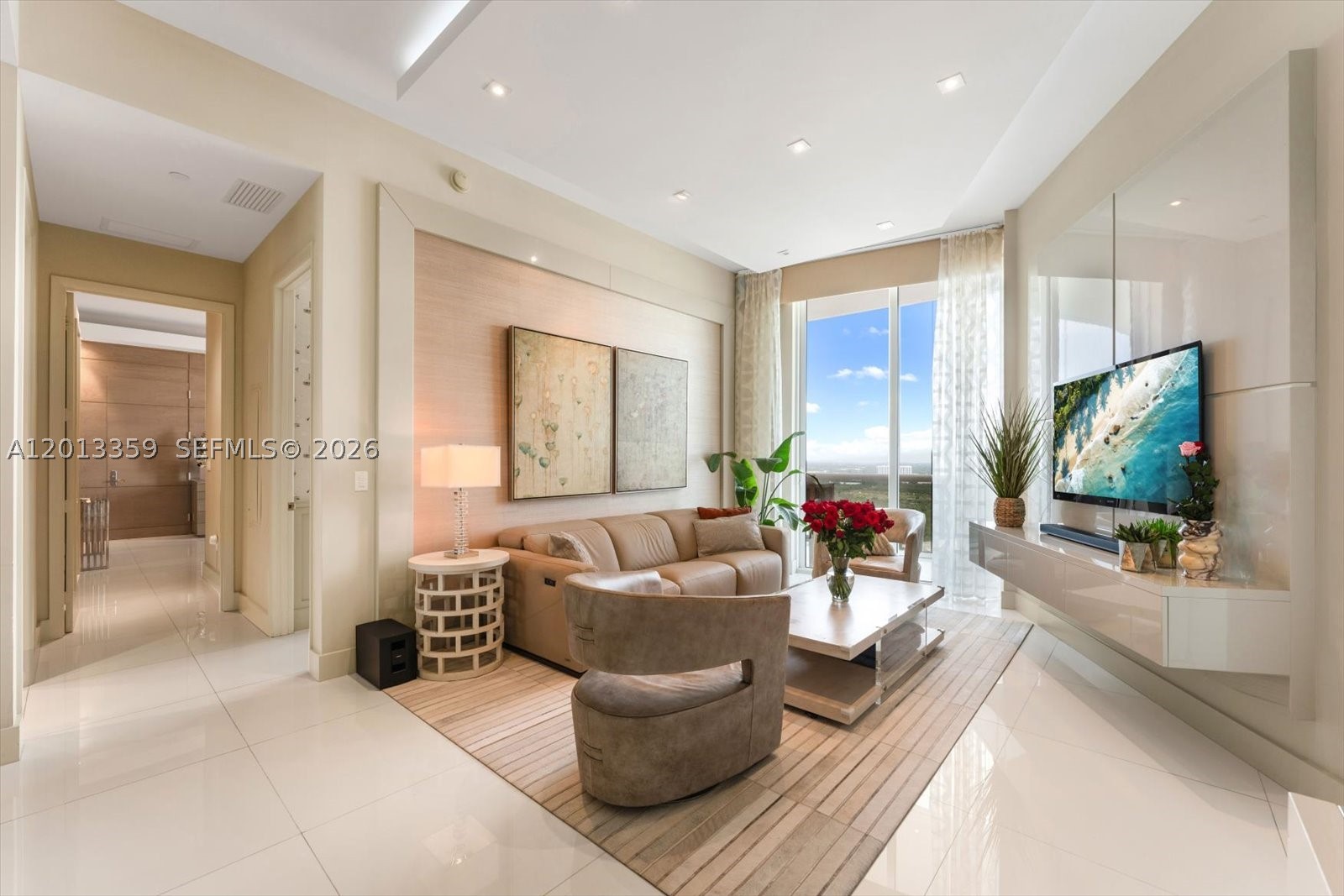 Turnkey residence at Trump Tower III professionally designed by Steven G. Interiors and offered fully furnished with all designer furniture, light fixtures, and electronics included. Features include 11-ft ceilings, marble floors, electric blinds, floor-to-ceiling windows, and an oversized 450 SF balcony with breathtaking sunset views of the Intracoastal, Biscayne Bay, and Miami skyline. Gourmet kitchen with Sub-Zero, Wolf & Bosch appliances. Enjoy 5-star amenities including beach service, spa, fitness center, concierge, valet, heated pool, and 24-hour security.