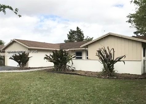 Tucked inside the sought-after Shores of Calusa, this 4-bed, 2-bath single-family home is brimming with possibility. Just a short stroll to Our Lady of Lourdes Catholic Church, it offers the kind of location buyers cling to and the kind of canvas investors crave. In a neighborhood where there is pride of ownership shows in every well-kept, continually updated property, opportunities like this are increasingly hard to find. Roof has 11 years of life and home inspection available for your review. Inside, vaulted ceilings with original oversized wooden beams set the stage for a stunning transformation. The interiors are ready for your vision, making this the perfect chance to imprint your style from the ground up. The generous yard invites big dreams: a future pool, outdoor kitchen, lush landscaping; there’s room for it all. The 2-car garage adds even more upside, with potential to convert and expand the home’s square footage. Delicious Avocados from a 40 year old tree! A home with strong bones, character details, and endless potential, this property is priced to sell and primed for its next chapter.