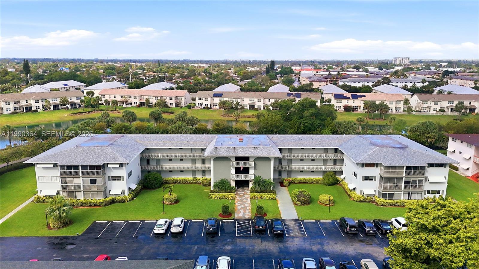 Welcome to Hillcrest! Located in a quiet cul-de-sac with direct access to a serene park and walking path around a beautiful pond, this charming 1BR/1BA condo on the third floor has been recently renovated. The unit features a new bathroom and an updated kitchen with new appliances, faucet, granite countertops, and a widened passthrough to the dining area. Additional upgrades include new flooring, extra closet space, new interior plantation doors, no popcorn ceilings, and new light fixtures. Enjoy peaceful backyard views from the screened balcony.
The building was painted in 2025, the roof is only three years old, and the 40-year inspection has been completed. No assessments and reserves are fully funded.
This self-managed building offers low maintenance fees and a recently remodeled laundry room on each floor. Amenities include a clubhouse and heated pool across the street, two additional pools, a community gym, and two BBQ areas. Residents enjoy 5 miles of scenic walking trails along the lakes and access to three public golf courses, with optional pickleball and tennis memberships.
Prime location just minutes from Hollywood Beach, shopping, dining, Hard Rock Hotel & Casino, the Turnpike, Fort Lauderdale Airport, I-95, Gulfstream Park, and Aventura Mall.
No pets. No rentals for the first 2 years. Easy to show—you’ll love to call this home!