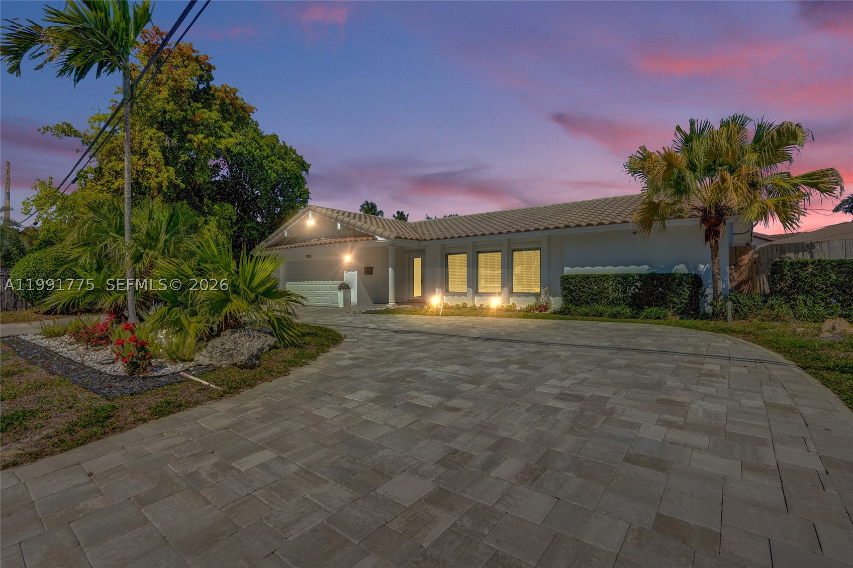 There’s a certain kind of home that changes the way life feels the moment you arrive , where weekends stretch a little longer, evenings feel more effortless, and every space invites people to stay awhile. At 4100 Bayview Drive, that feeling begins on the water. Set in the heart of Coral Ridge Country Club, this waterfront residence offers the rare luxury of ocean access with no fixed bridges, giving boating enthusiasts the freedom to head out with ease and return home to a setting that feels private, polished, and deeply relaxing not to mention the convenience of a corner lot and circular driveway. 

Inside, the home balances comfort and connection beautifully. The split floor plan creates privacy where you want it most, including a private primary suite that feels like a retreat an open bright kitchen with a large dining area and Florida room that create the kind of flow that makes entertaining feel natural. Picture slow mornings with sunlight reflecting off the pool, afternoons that move seamlessly from indoors to outdoors, and evenings filled with laughter, dinner, and the easy rhythm of waterfront living. This home is designed not just to be seen, but to be lived and can be enjoyed by anyone. Great for snowbirds or investors who want to take advantage of this once in a lifetime opportunity in the Florida's most sought out neighborhood in Coral Ridge, with no HOA. IMPACT WINDOWS. NEWER ROOF, updated kitchen. ROOM TO ADD EXTENSION AND BUILD .