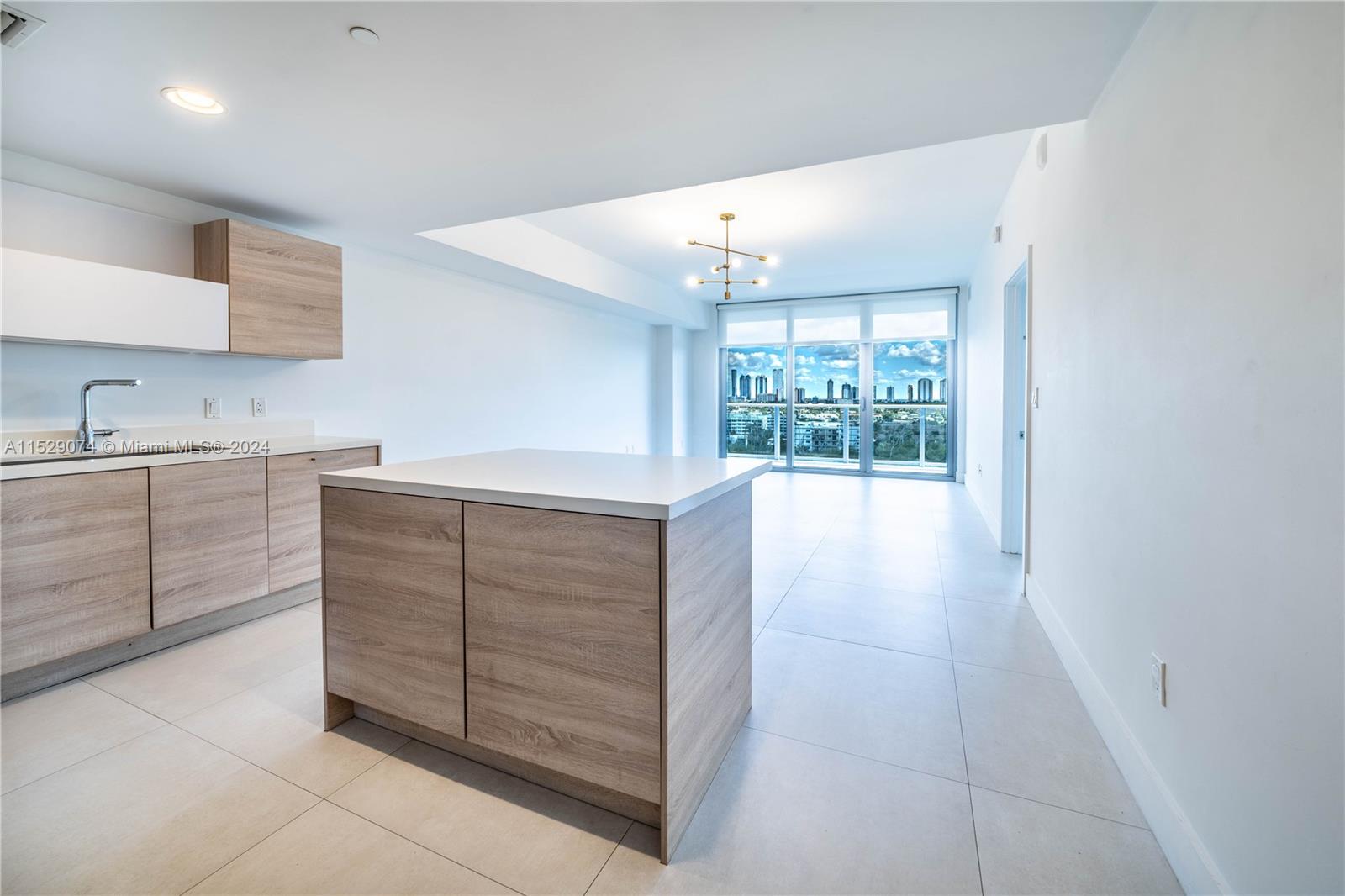 Modern apartment in the spectacular The Harbour condominium. Unit with tile, shower glass door in both baths and California walking closet with drawers. building offers state of the art common areas, pool, spa, sauna, gym, children room area, beach access to intracoastal. 24 h security guard, valet parking, basket. Equal Housing Opportunity.