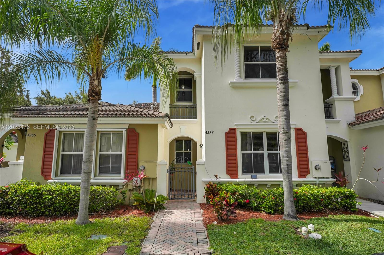 FHA and VA loans Welcome! Welcome to this well maintained Marbella Bay gated community 3 bed/2.5 bath Townhome. Built in 2006, this spacious residence offers 1,584 sq ft of living area. Townhome has its own private patio. Low HOA only $157 a month, community pool, clubhouse, and ample guest parking. Newer roof, AC, water heater.  Conveniently situated near shopping centers, charter schools, and with easy access to the Florida Turnpike.