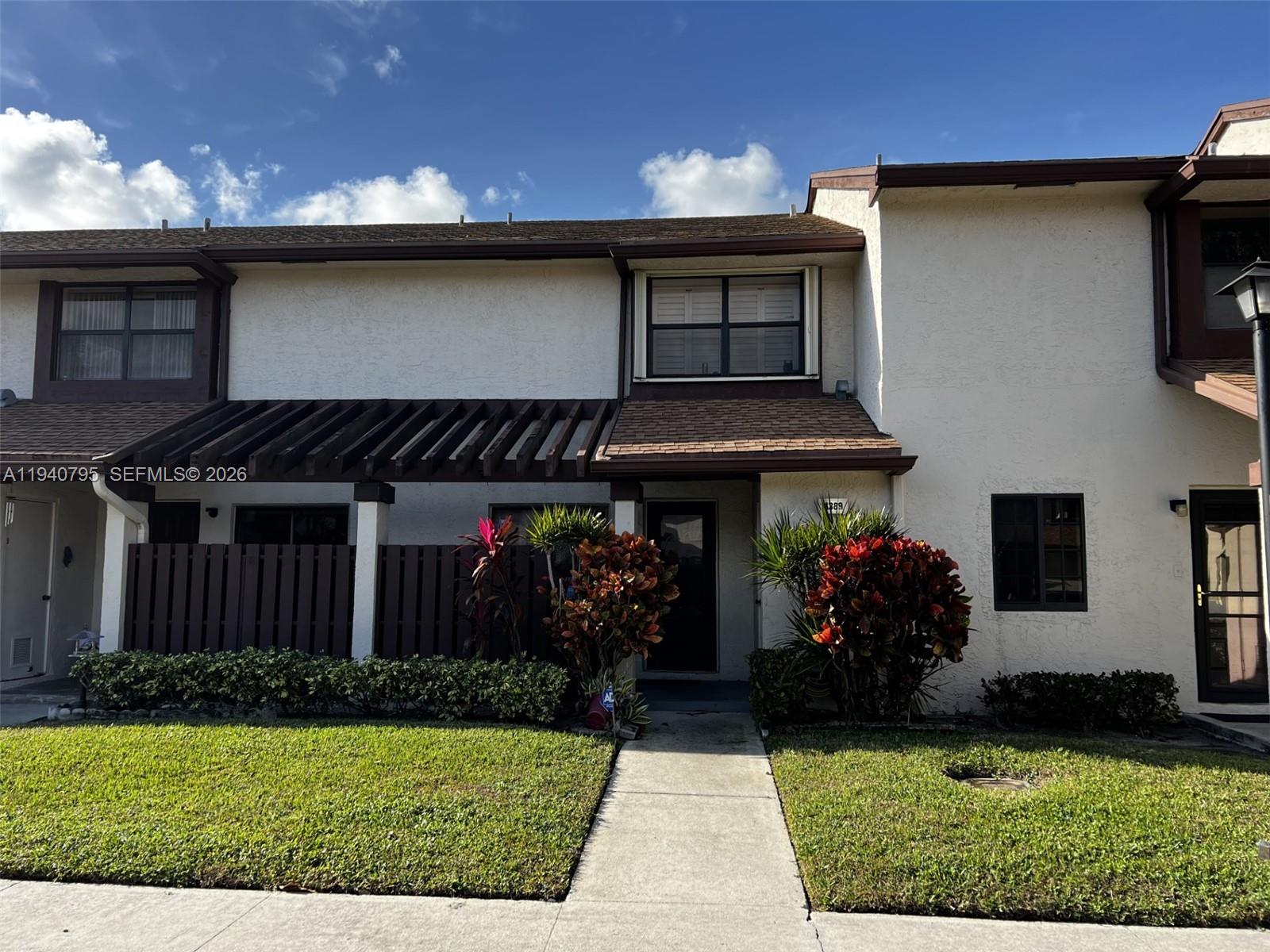 Discover the perfect blend of space and value with this generously sized townhouse, offering exceptional features at an attractive price. Situated in a desirable location, the prestigious Township in Coconut Creek, this masterpiece unit features a relaxing and captivating lake view from the spacious living room. This generously sized townhouse features 2 bedrooms with 2 bathrooms and a half bath on the first floor. Don’t miss out on making this remarkable property your new home. RESORT STYLE AMENITIES: Olympic pool, fitness room, basketball, volleyball, game rooms, clubhouse, theater, etc. 1mile to The Promenade. HOA fee is $471/Mo. plus $189/Q for the Township Master Association.