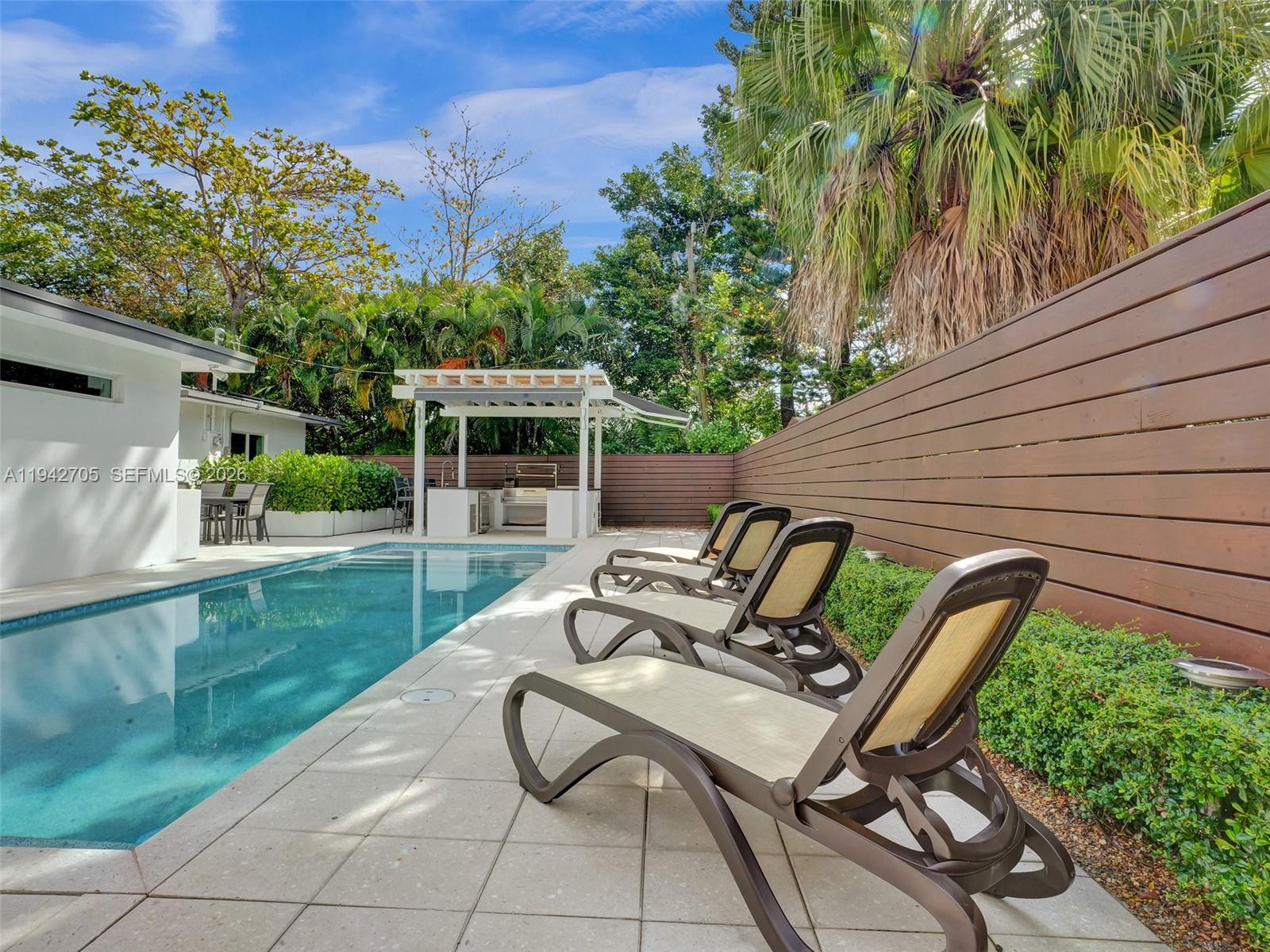 Experience the perfect blend of comfort and lifestyle in this move-in ready home located in the desirable Croissant Park neighborhood of Fort Lauderdale. This well-maintained residence offers 3 bedrooms and 2 bathrooms, with a garage currently being converted into a 4th bedroom, providing added flexibility for modern living.

Bright interiors and a functional layout create a welcoming atmosphere, ideal for both everyday living and entertaining. Step outside to a stunning private backyard featuring a beautiful pool and a fully equipped outdoor bar with grill, perfect for hosting gatherings and enjoying the South Florida lifestyle.

Ideal for families, entertainers, or anyone seeking indoor-outdoor living with added space and versatility.

Conveniently located just minutes from Las Olas, Downtown, beaches, parks, shopping, dining, and major highways.

Move-in ready and not to be missed.