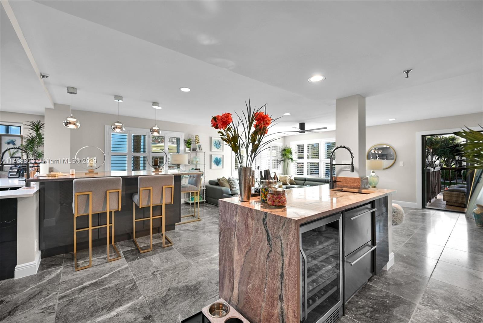 This luxurious, remodeled 3 bed/2 bath condo has a delightful partial intracoastal view. This home features an open floor plan, a waterfall wet bar and large wine fridge. The kitchen offers a pleasant space for all your cooking and entertainment needs as well as a vast amount of cabinetry space. There are large impact windows which offer natural light and accordion shutters. Master bedroom is spacious and entails a his and hers walk in closet, a dual sink and shower head and sit-down area. All other bedrooms offer a favorable space and sizable closets. There is LED and recess lighting throughout the home and located in central North Palm Beach. You have shopping, restaurants and beaches just moments away!